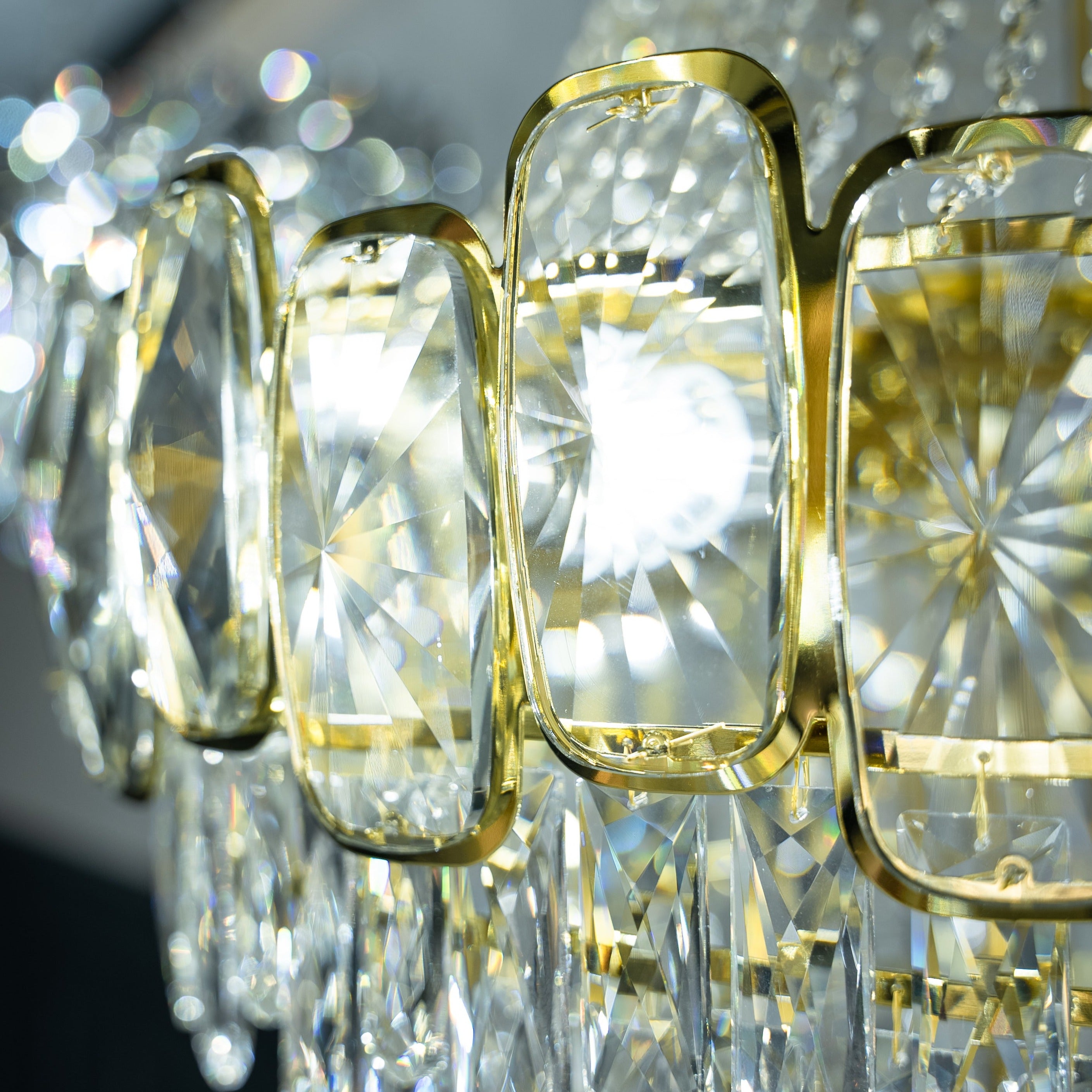 Detailed view of faceted crystal elements used in the Edison Grandeur chandelier by VORELLI®
