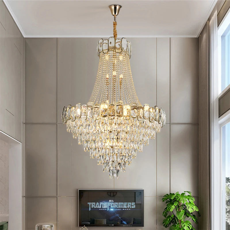 Edison Grandeur staircase chandelier by VORELLI® featuring cascading classic crystal tiers in a grand interior