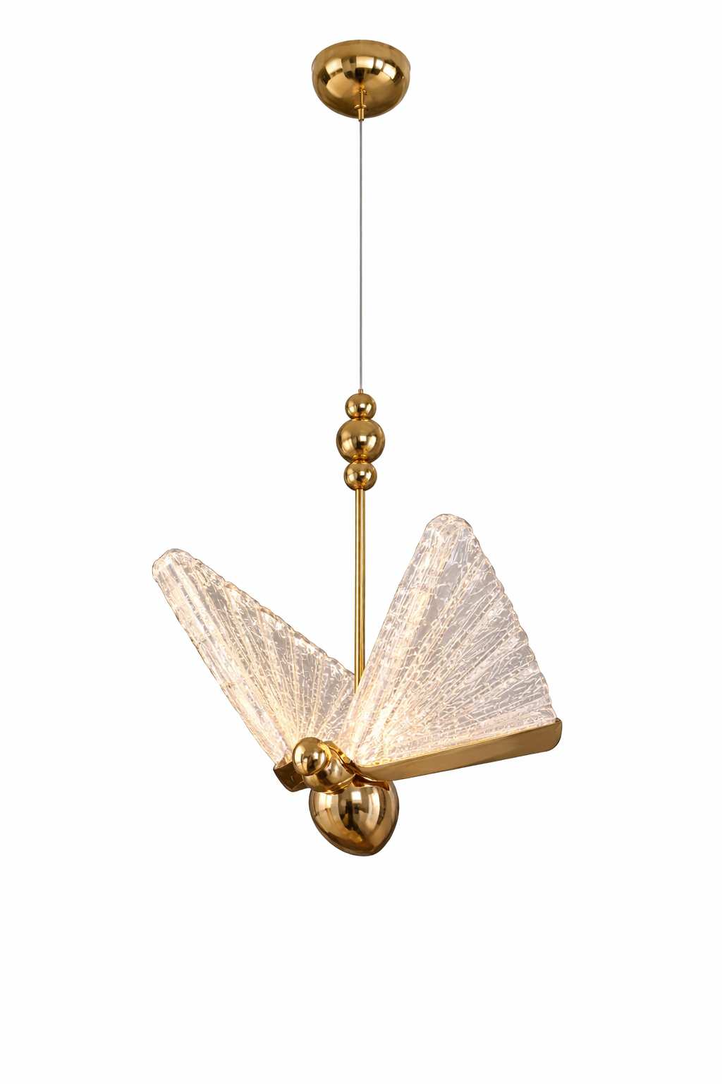 Elegant VORELLI Butterfly crystal pendant light illuminating a contemporary kitchen island with a soft, warm ambiance.
