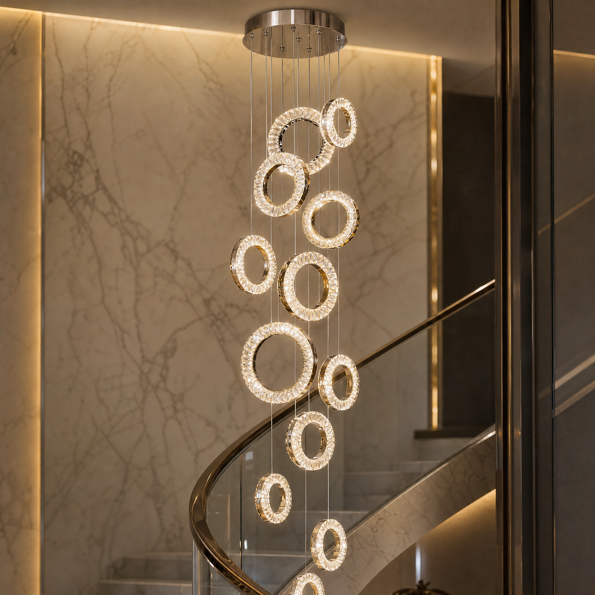 A detailed close-up of the VORELLI Farnham chandelier showing the intricate diamond-cut crystal ring pendants reflecting brilliant light.