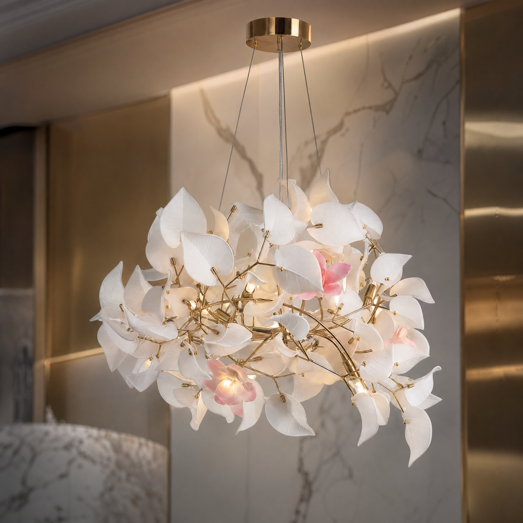 Close-up detail of the Fiorella Circular Chandelier II showcasing the delicate sculptural white leaves and soft pink floral accents.