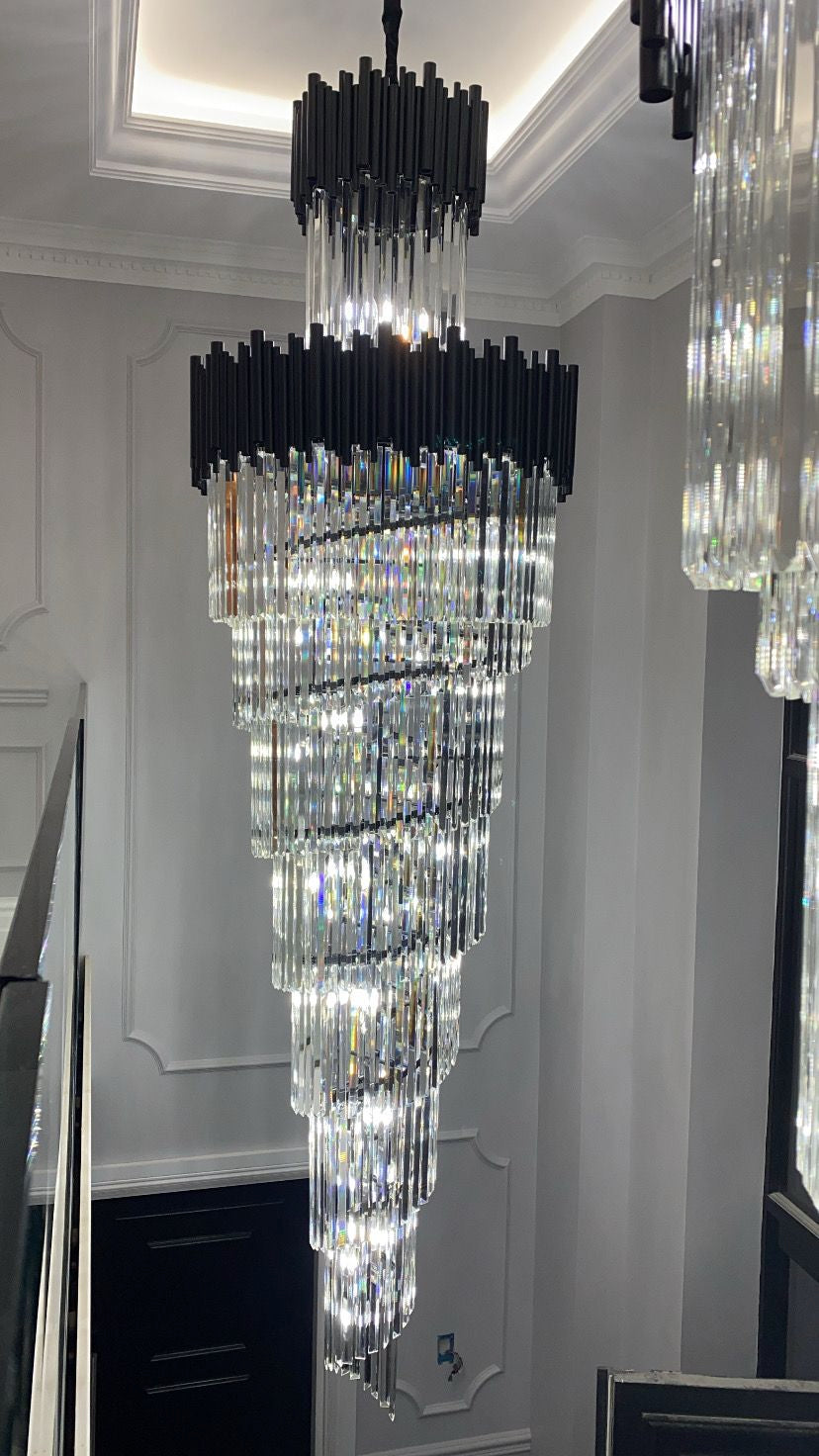 Luxury crystal staircase chandelier in double height entrance hall