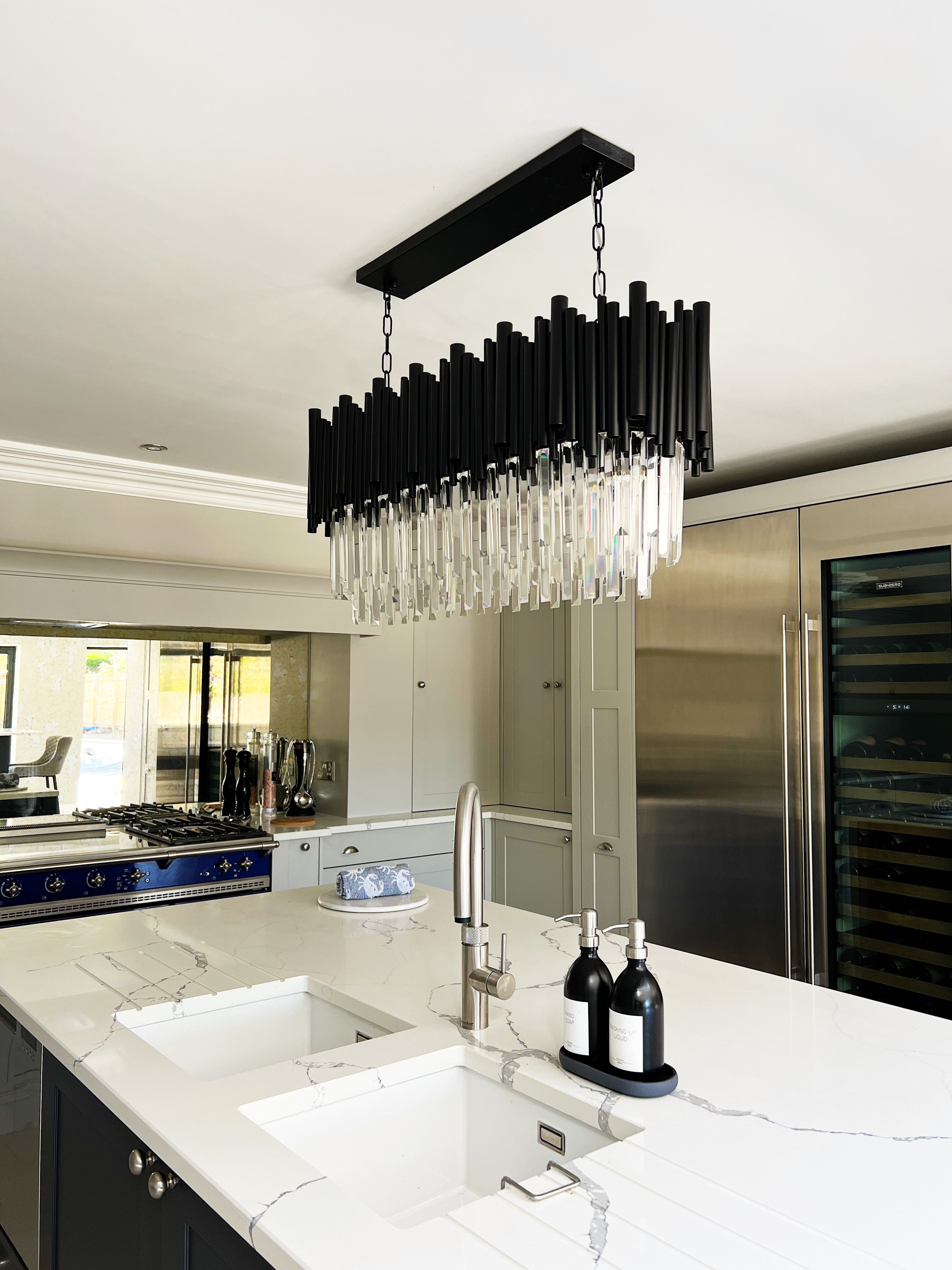 Luxury Gotham rectangular chandelier enhancing a high-end kitchen interior