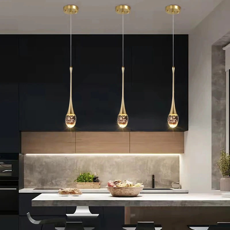 Henley Pendants installed as a trio above a contemporary kitchen workspace