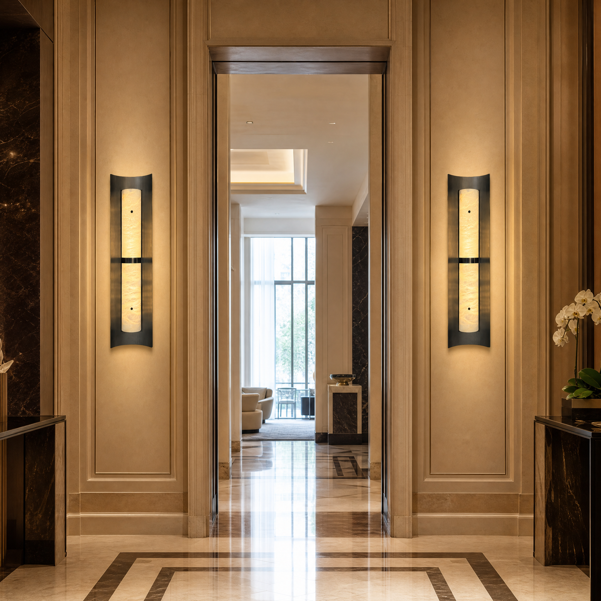 Luxury hotel interior featuring the sophisticated Hercules marble and brushed steel wall light