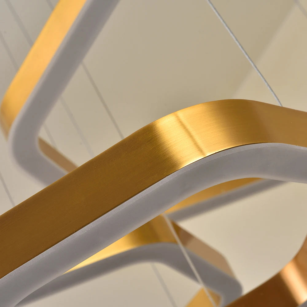 Hex Trio Circular Chandelier close up of softly curved hexagonal frame with refined modern lighting design