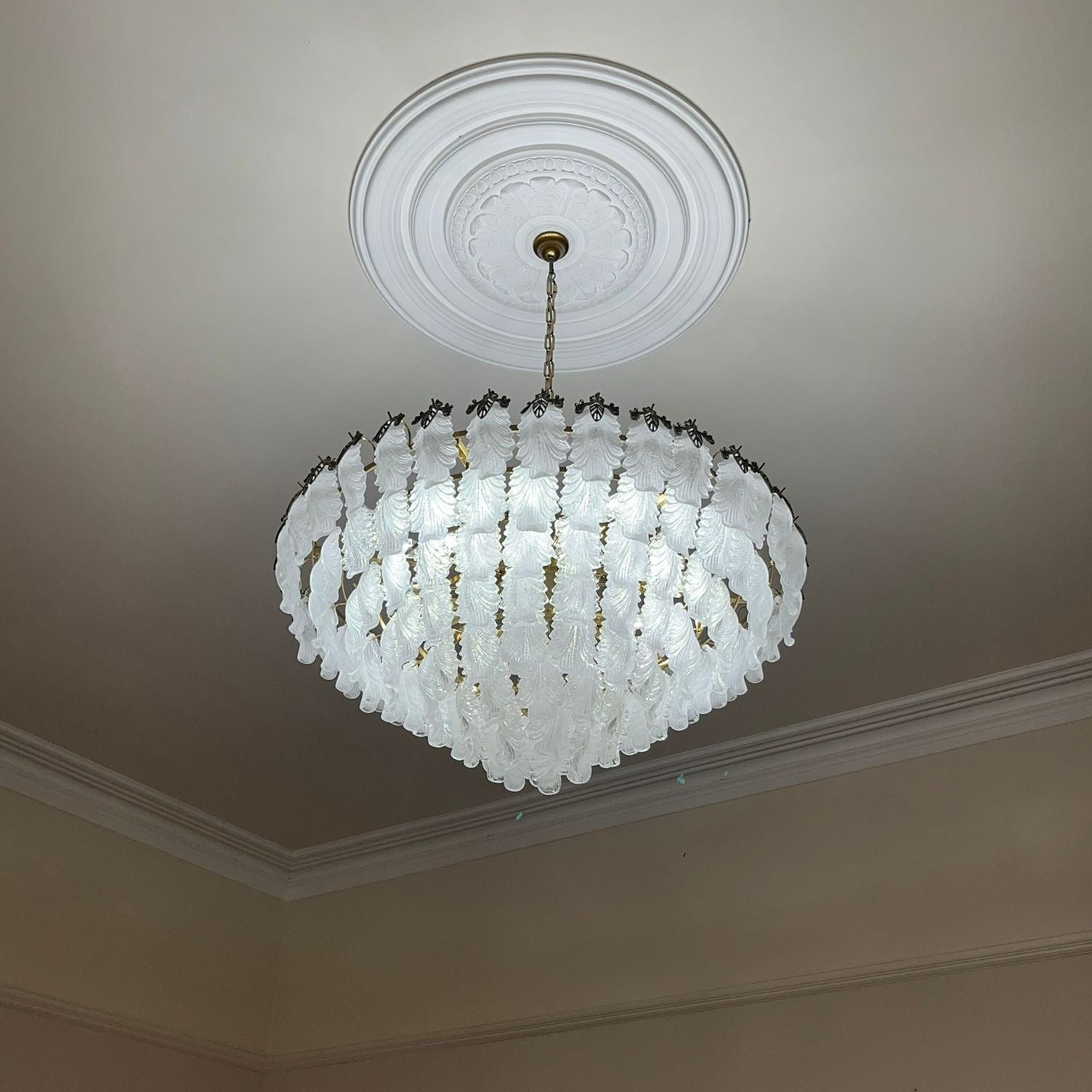 Julio Circular Chandelier ceiling installation showcasing layered circular crystal structure