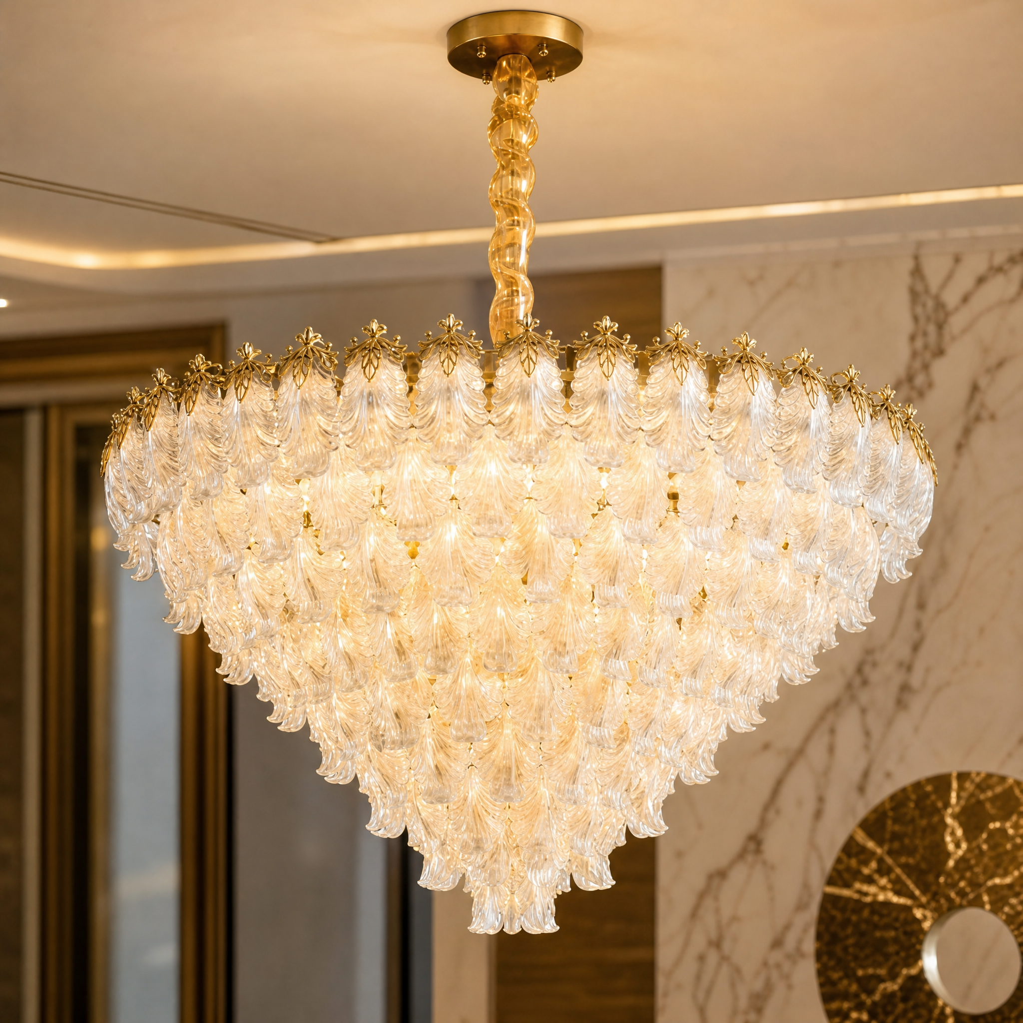Close-up of the handcrafted feather-shaped crystals on the VORELLI Julio chandelier showcasing artisanal luxury.