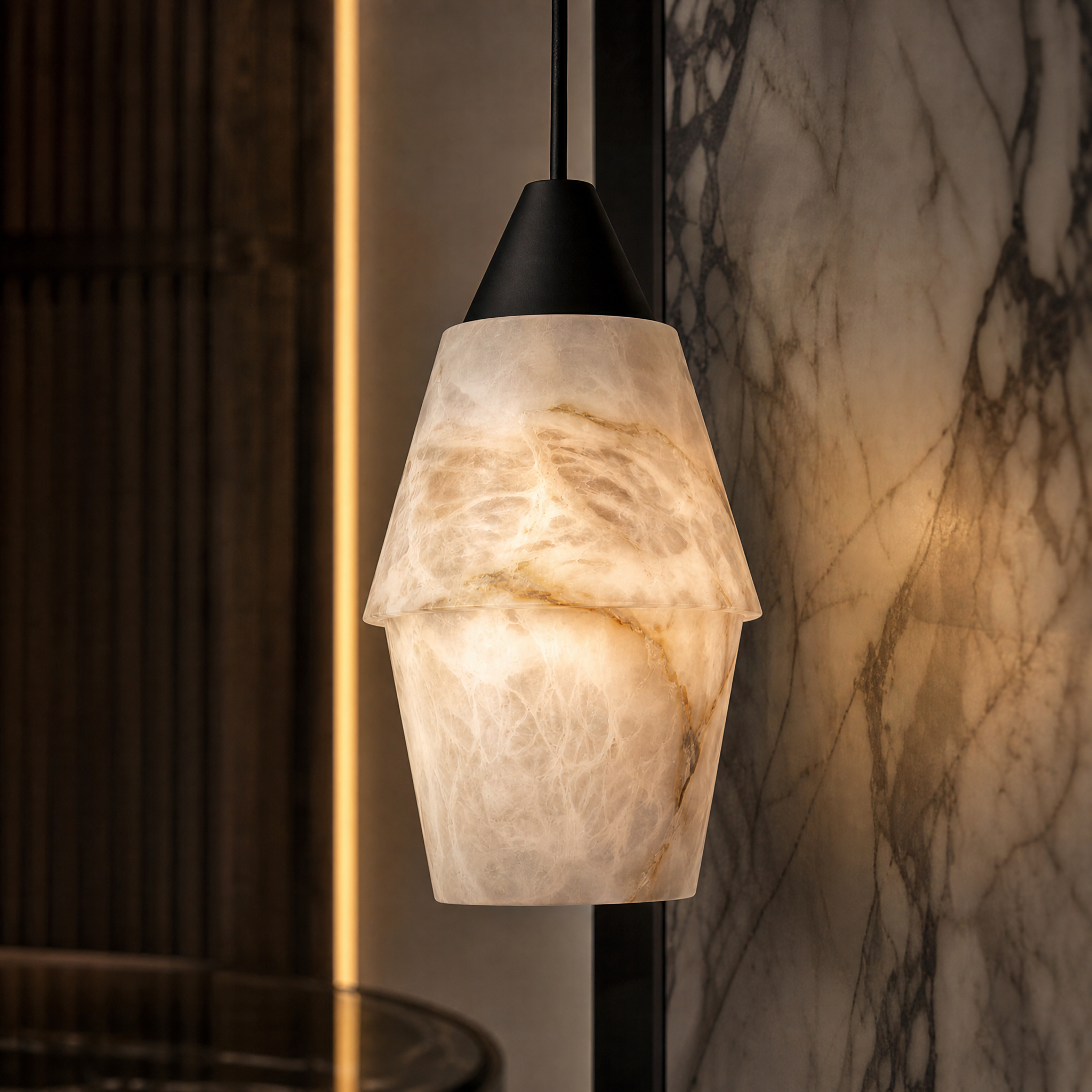 A detailed closeup of the VORELLI Kalia Marble Pendant Light III, highlighting the intricate natural veining and sculptural texture of the marble.