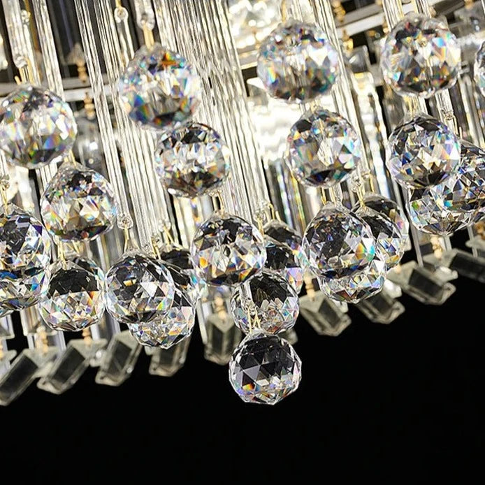 Kiara ceiling light with cascading diamond cut crystal strands and warm illumination