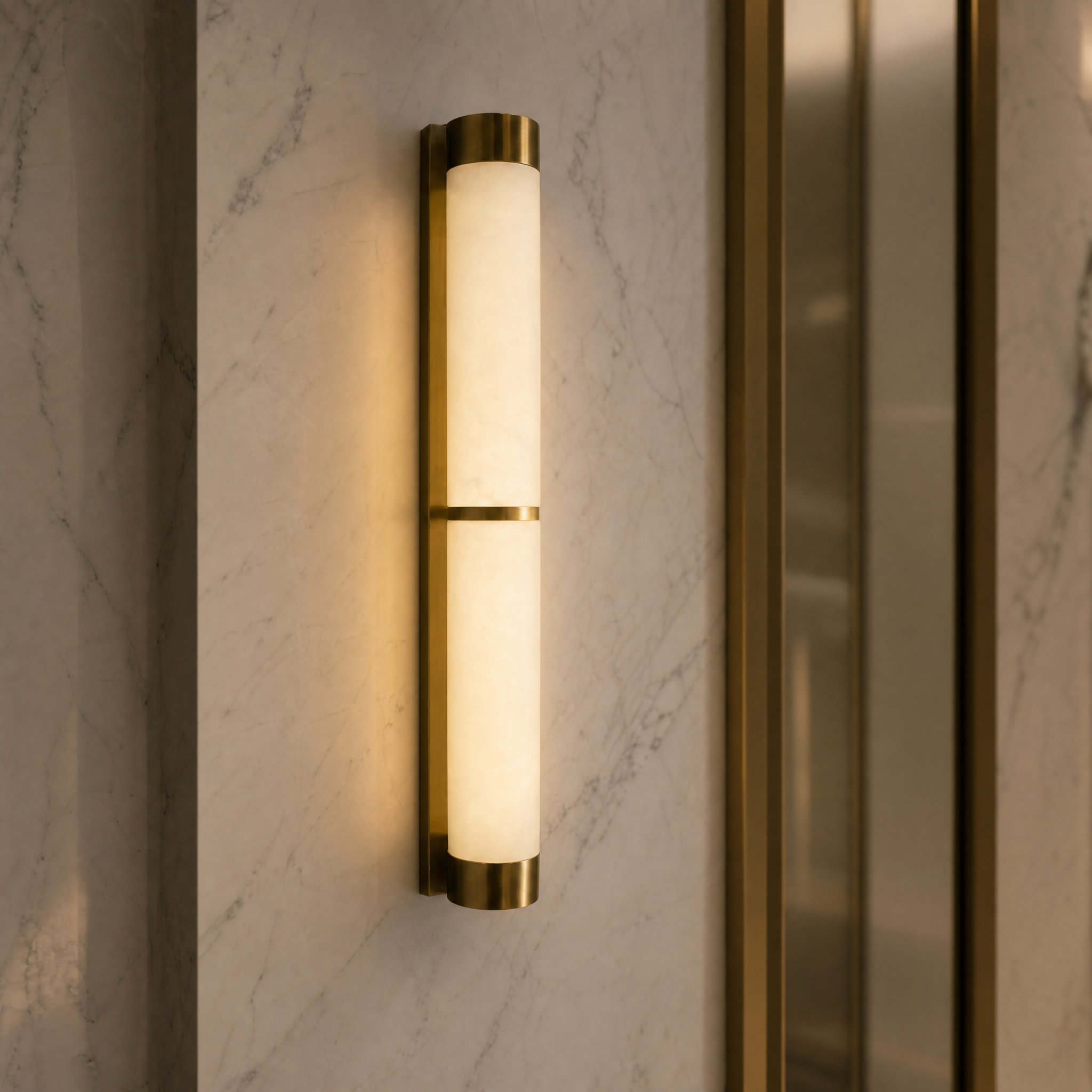 Macro view of the Lucente Wall Light showing the detailed texture of premium marble paired with sleek stainless steel.