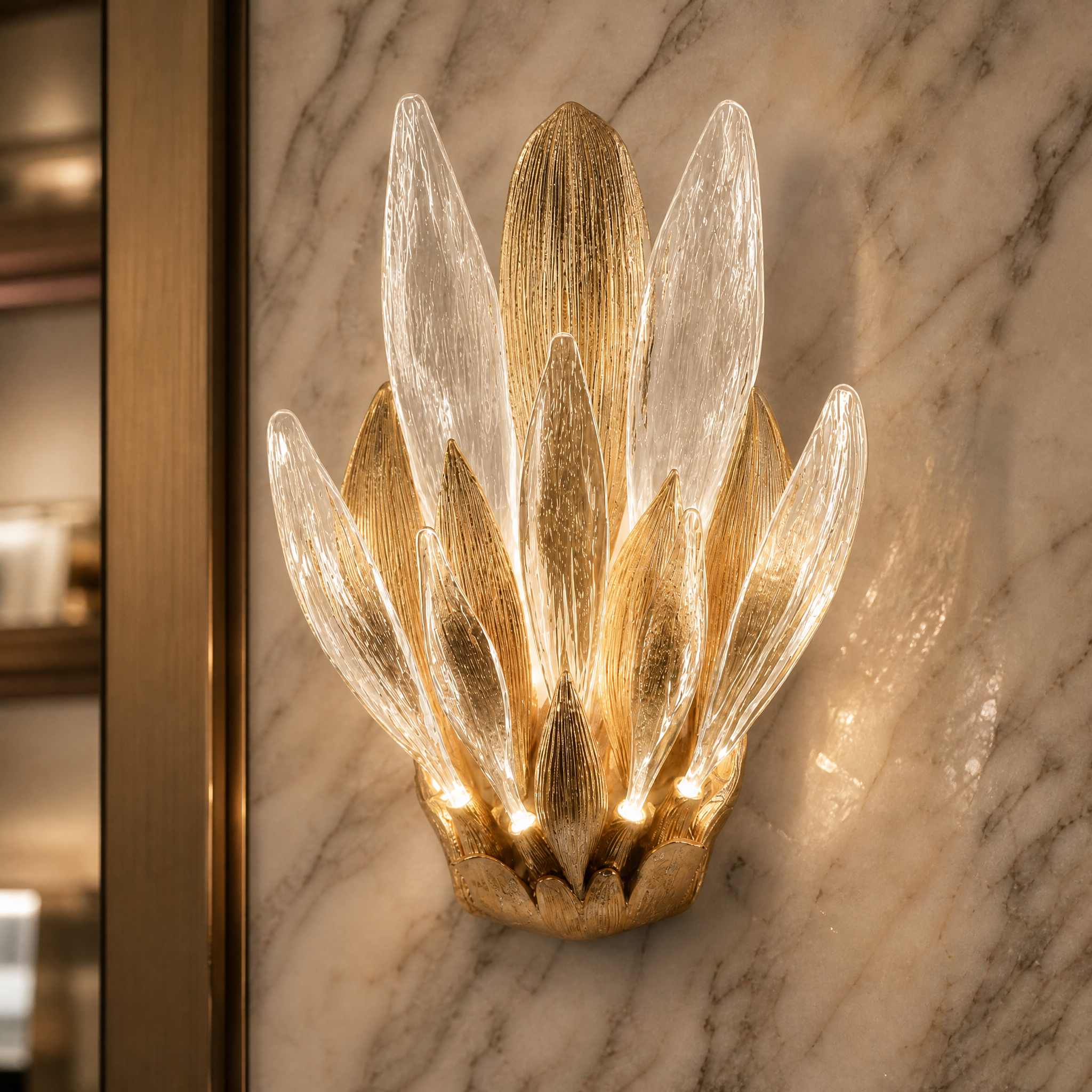 A close-up detail shot of the VORELLI Luciana Wall Light, highlighting the intricate craftsmanship of its organic, sculpted glass petals.