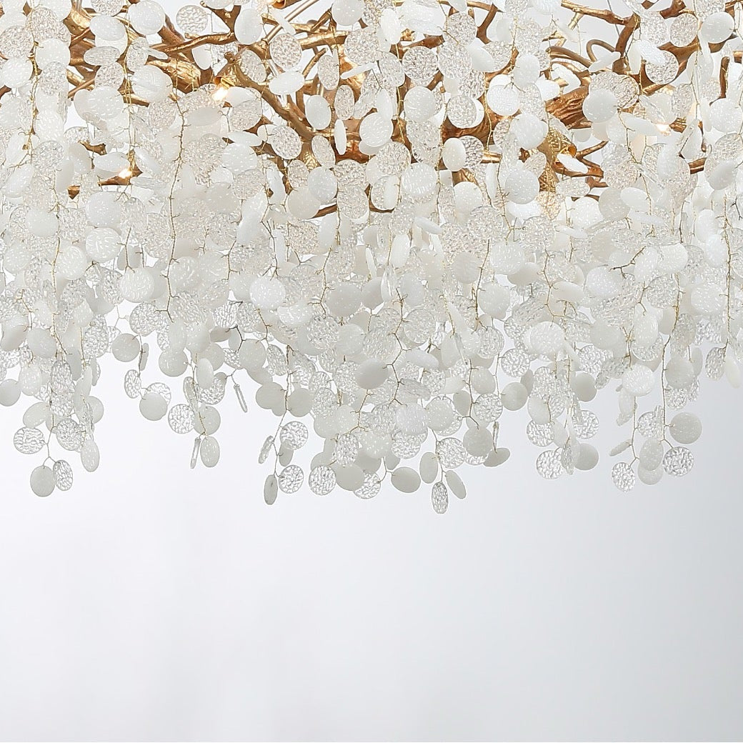 Cascading textured glass discs forming a luxury staircase chandelier