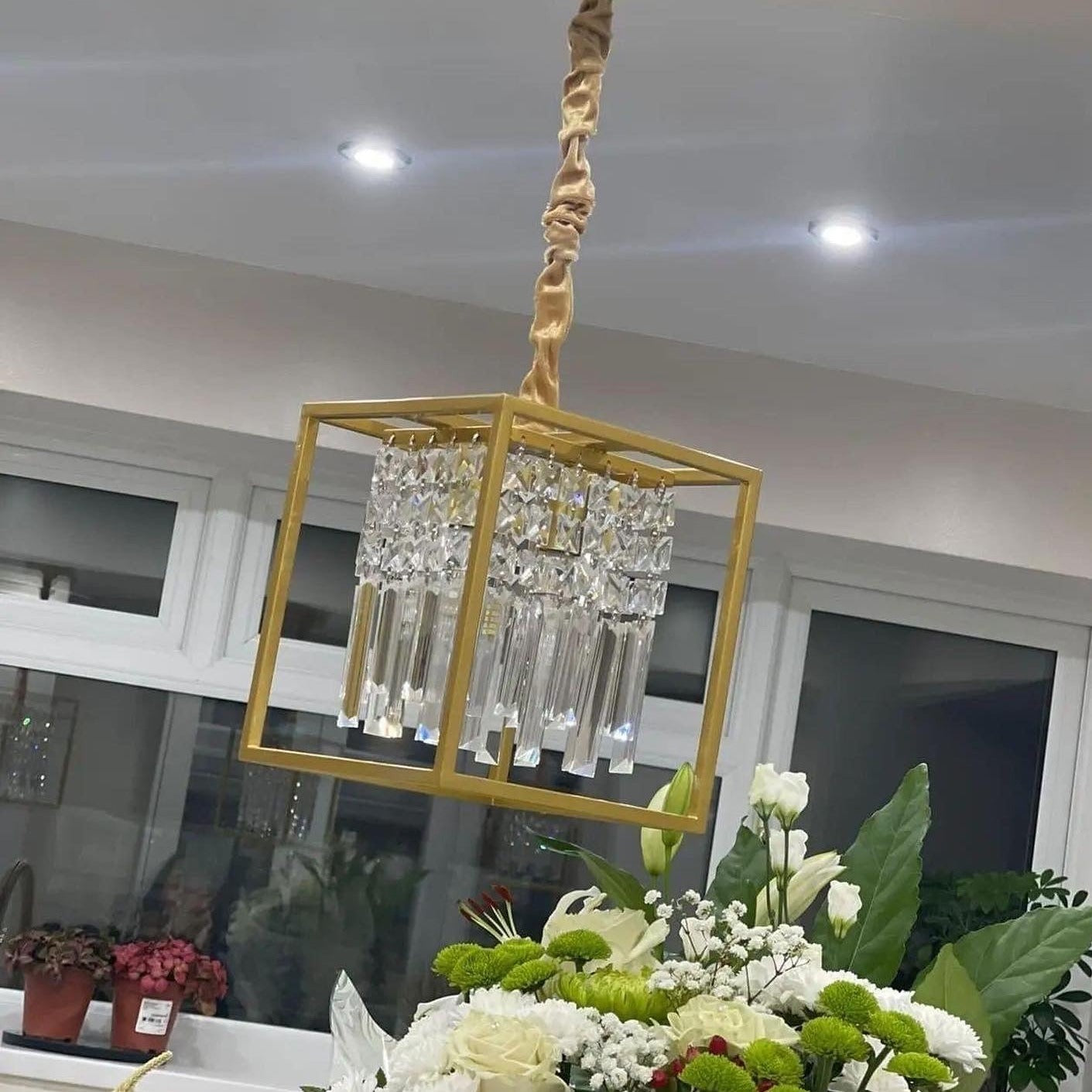 Close-up of Maddison pendant showing diamond cut square crystals and bars