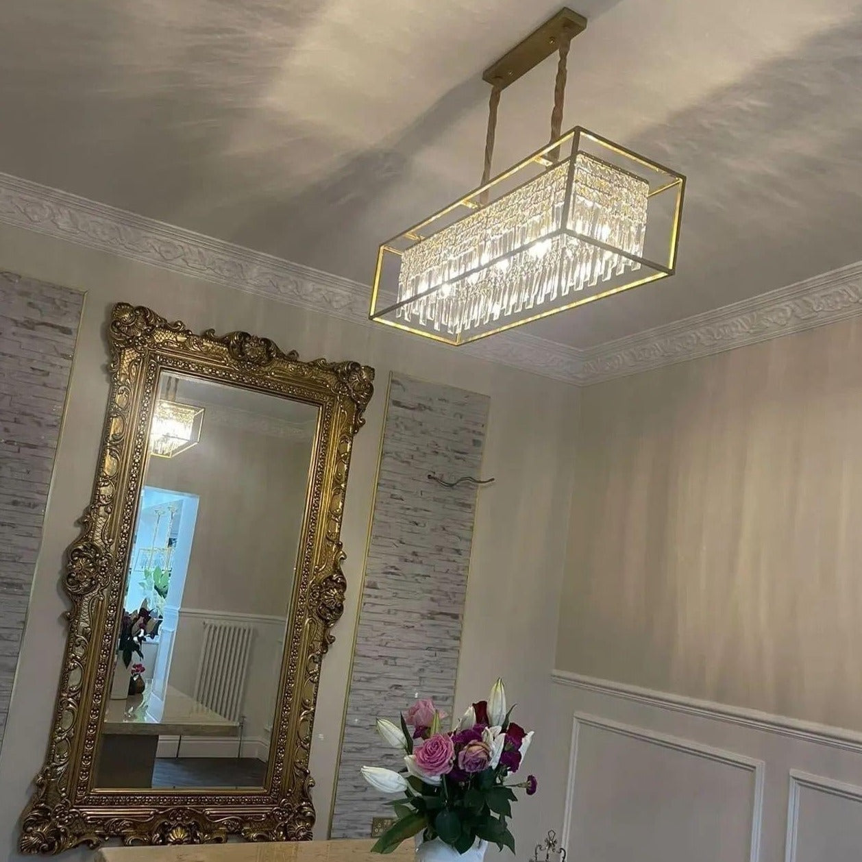 Maddison rectangular crystal chandelier positioned in a dining room setting