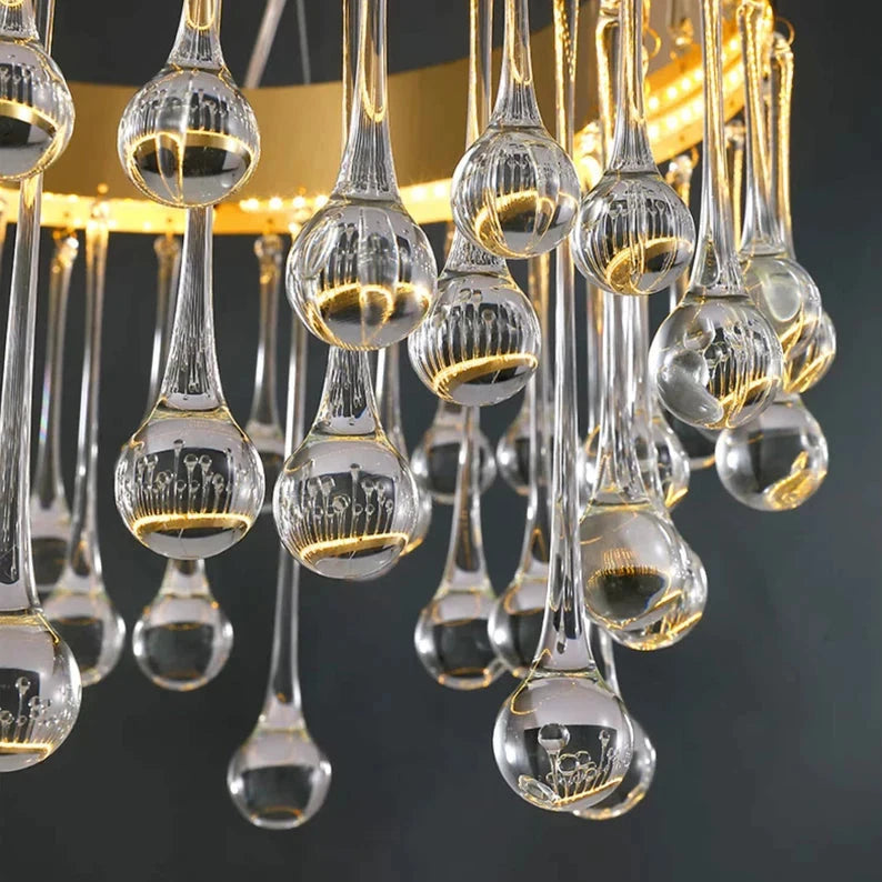 Close-up of decorative crystal droplets suspended from the Mancini rectangular chandelier
