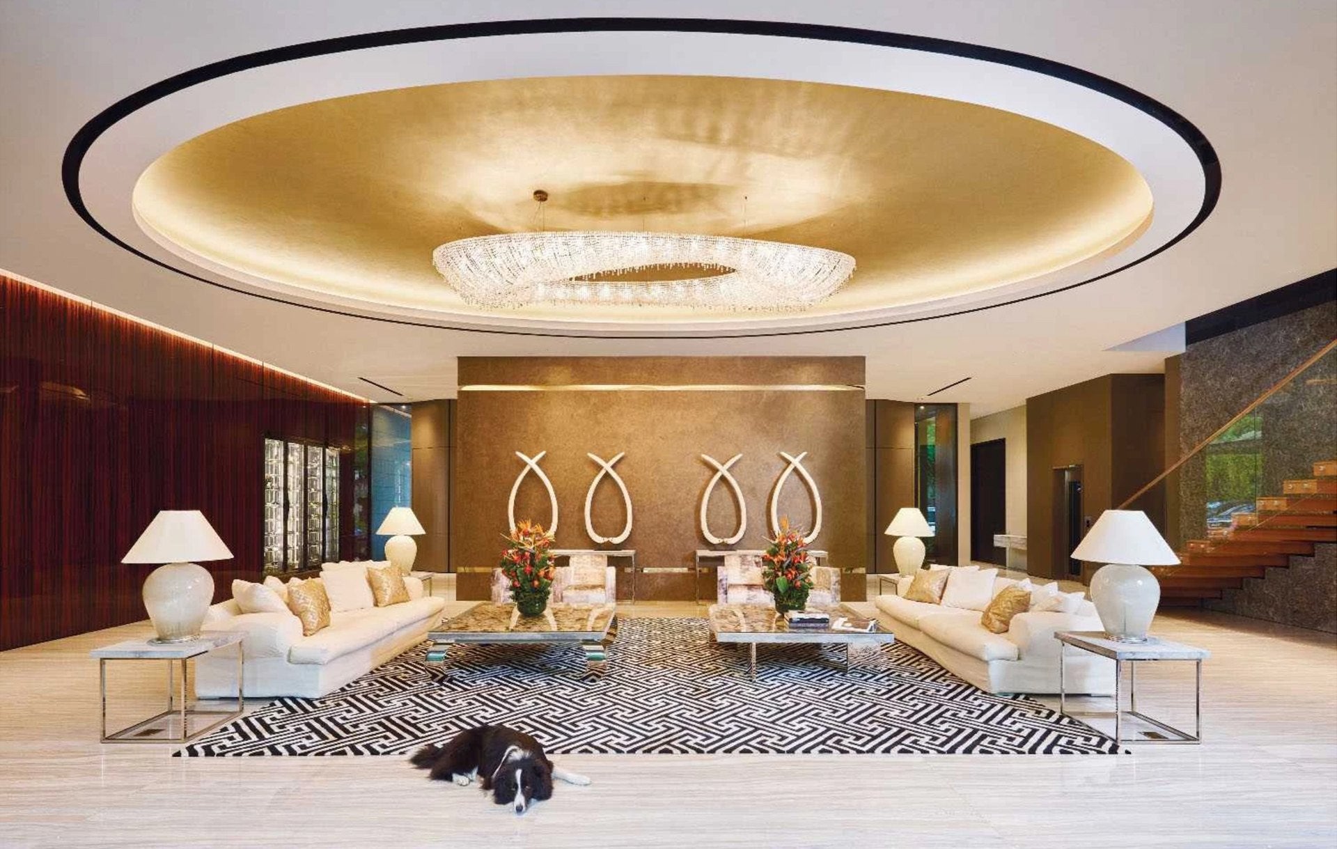 MANOOI Artica crystal chandelier in a contemporary luxury living room