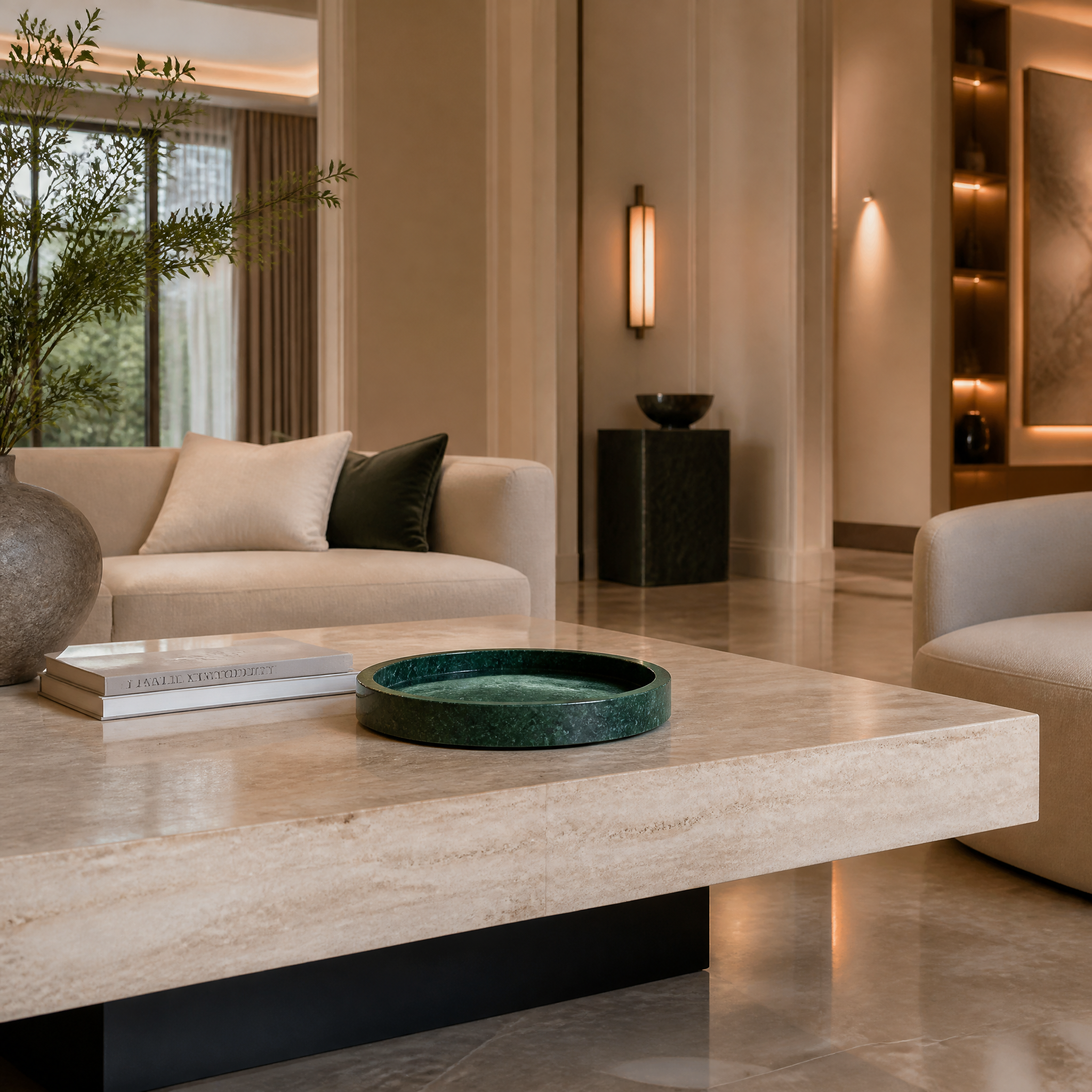 VORELLI Marbella green marble tray styled as a luxury living room table centerpiece with modern home decor accents.
