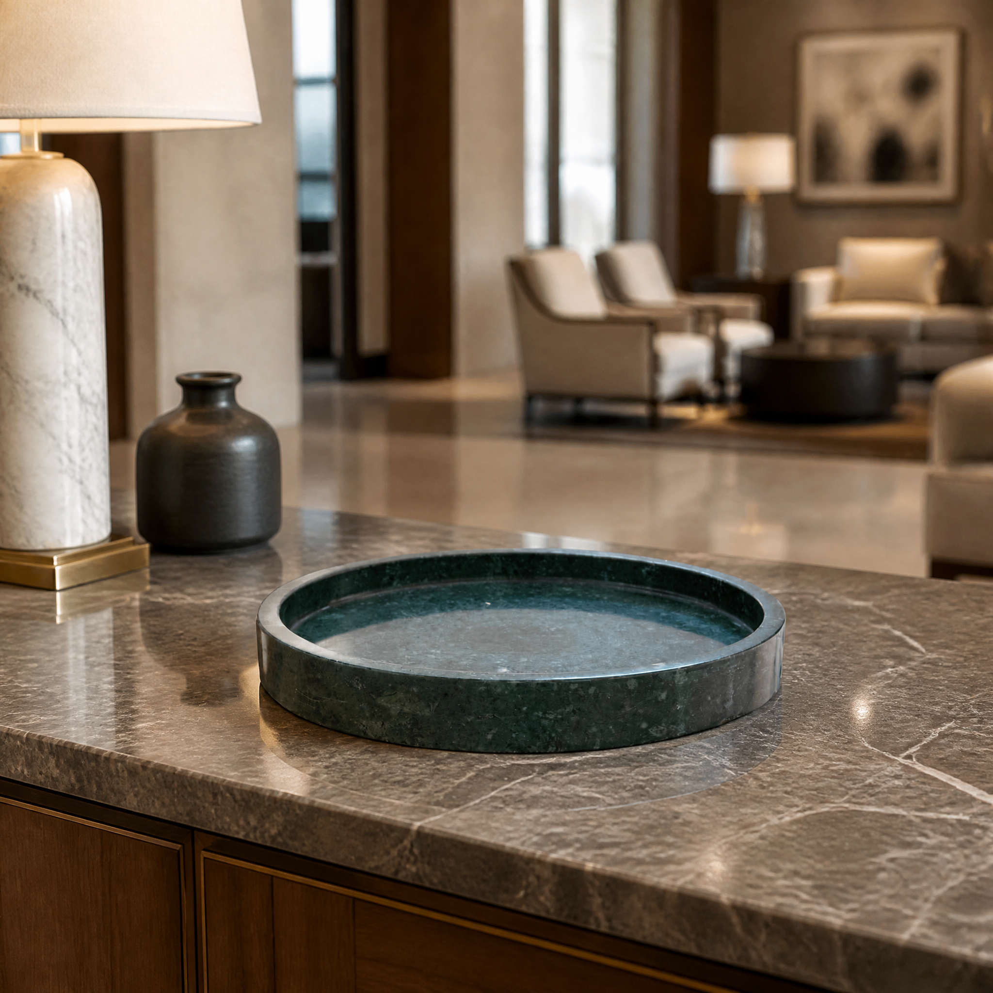 Luxury hospitality bathroom featuring the Marbella green marble vanity tray organizing high-end amenities on a sleek countertop.
