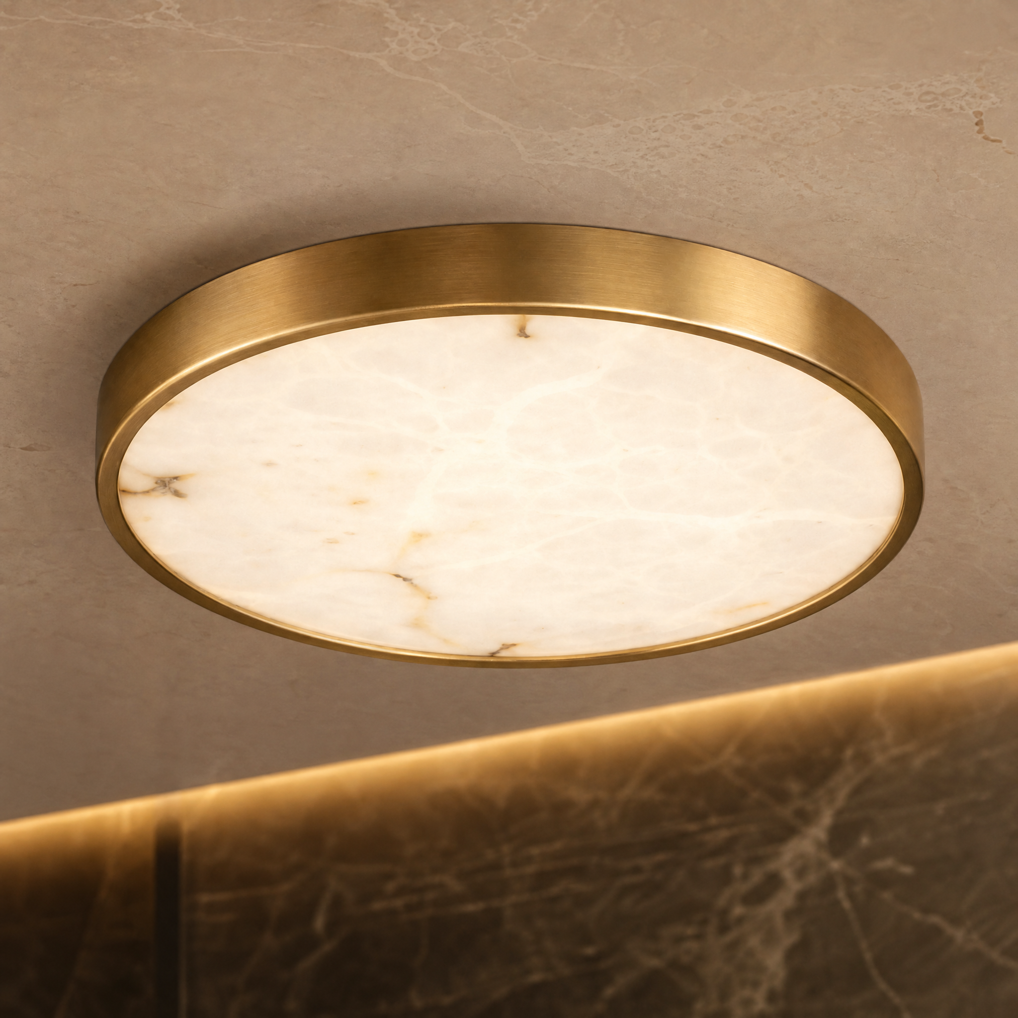 Close-up of the natural marble veining and circular craftsmanship of the Morenita ceiling light fixture.