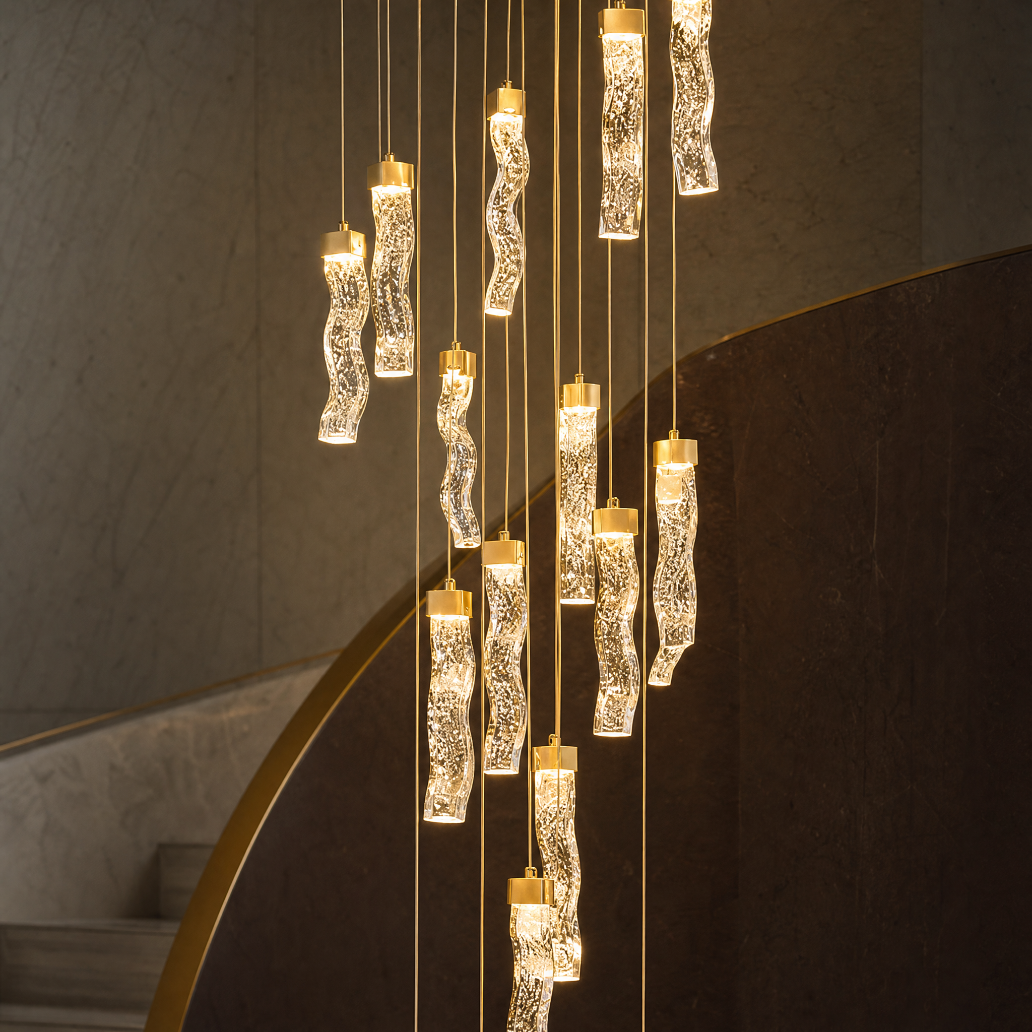 Macro view of the Palazzo staircase chandelier's cascading bubble crystal pendants, highlighting the intricate textures and elegant light refraction.