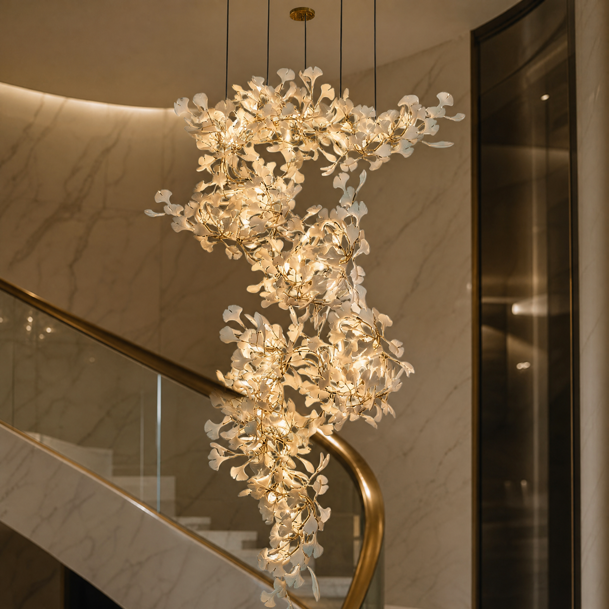 A detailed closeup of the VORELLI Prano chandelier showing the intricate, sculptural ceramic petals and refined linear structural forms.