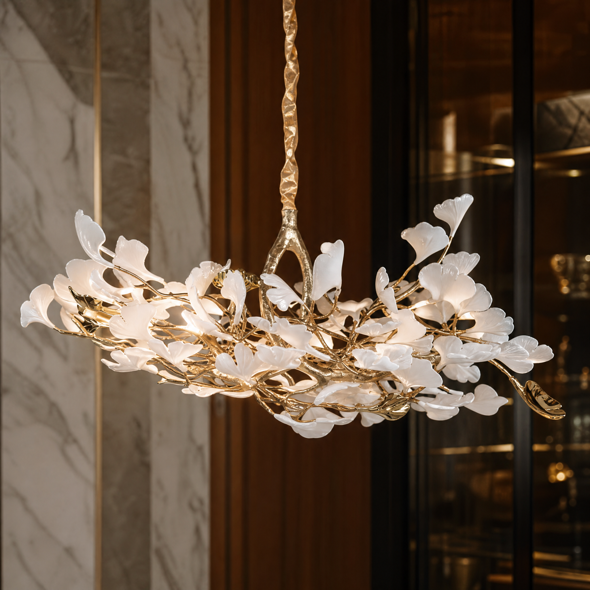 A detailed closeup of the VORELLI Prano Rectangular Chandelier II showing the intricate, sculpted porcelain petals and delicate organic branch structure.