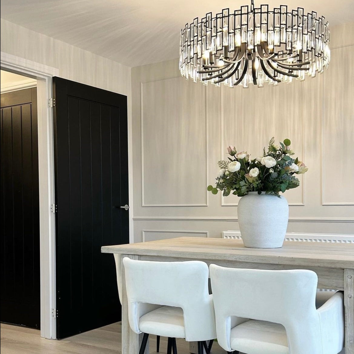 Presidio Circular Chandelier II enhancing refined interior with structured rectangular crystal bars