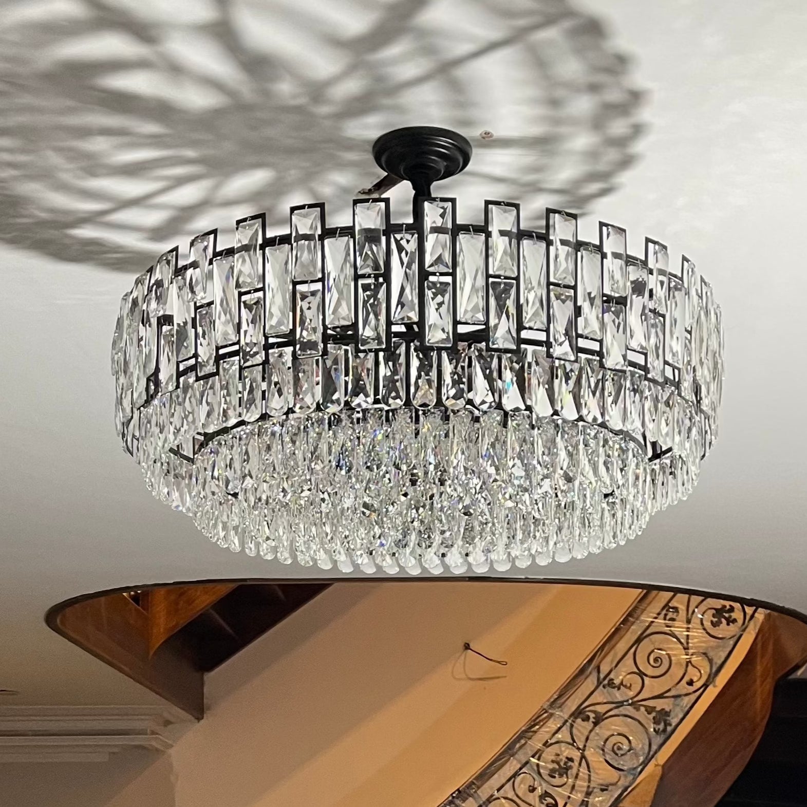 Presidio luxury circular crystal chandelier enhancing sophisticated dining interior