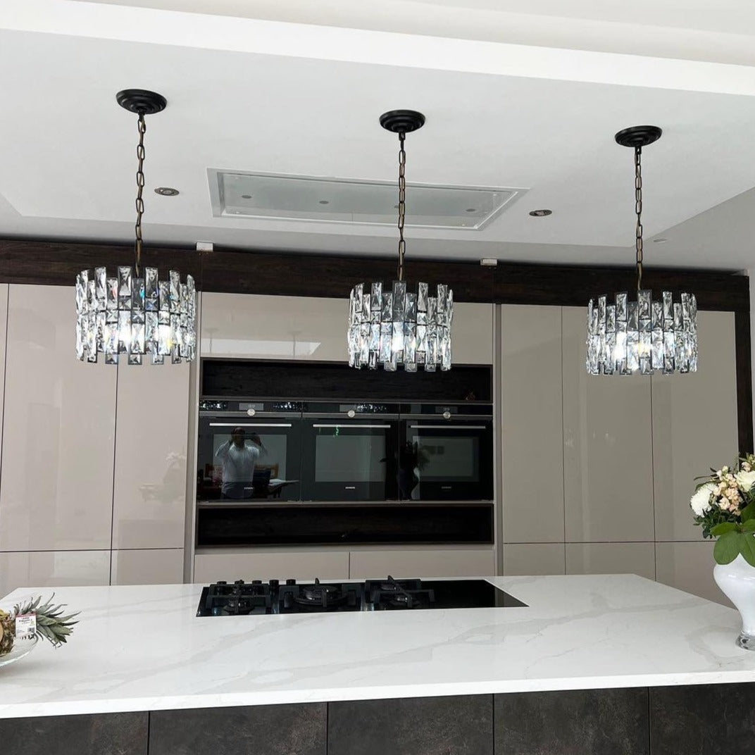 Presidio modern rectangular crystal pendant lights installed above kitchen island in contemporary interior