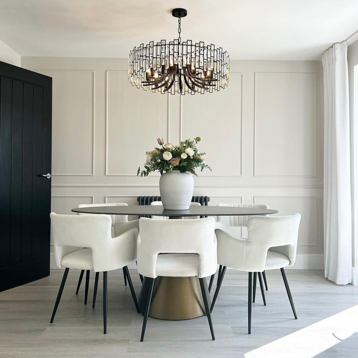 Presidio Circular Chandelier II installed above dining table showcasing layered rectangular crystal detailing