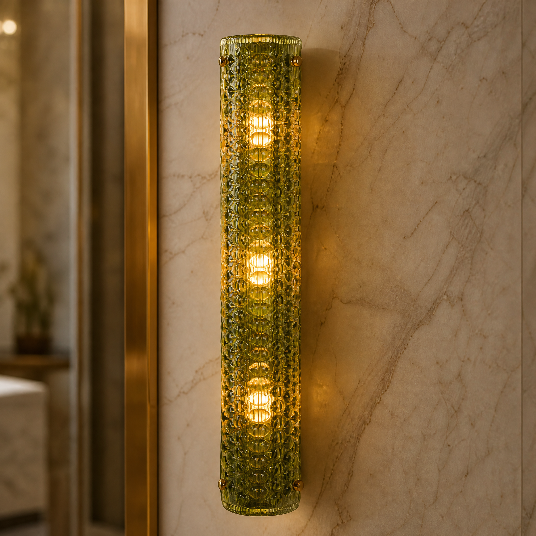 Detailed closeup of the Rapino wall light showcasing the rich texture of the dark green glass and subtle brass bolt accents.