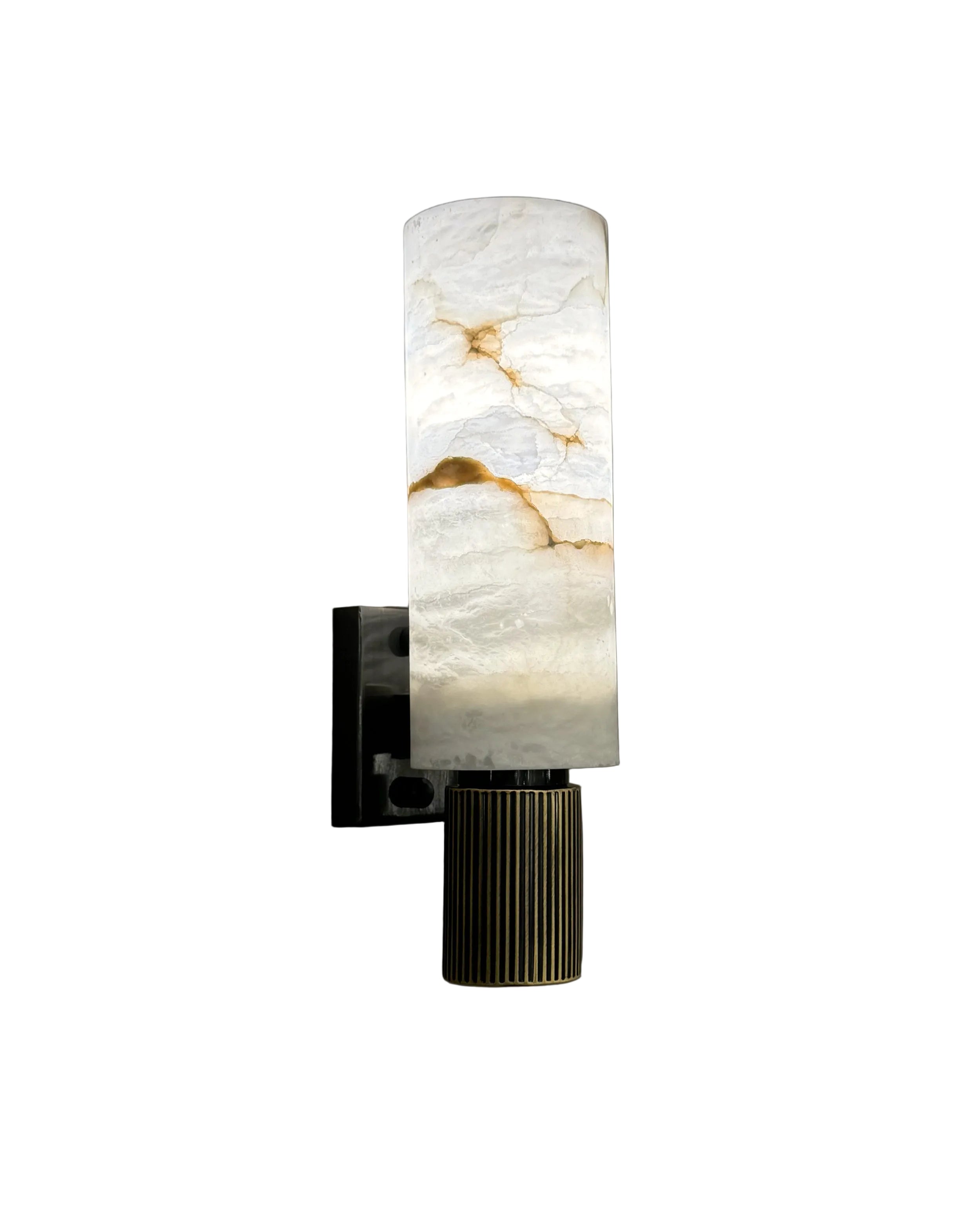 Riviera marble wall light featuring cylindrical veined stone shade mounted on structured wall plate on white background