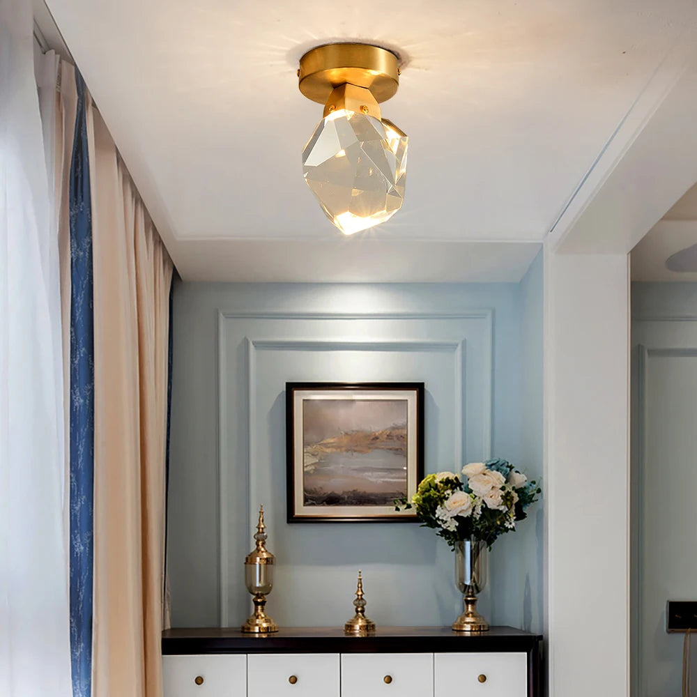 Detailed view of ceiling mount and faceted crystal on Runtz flush ceiling light