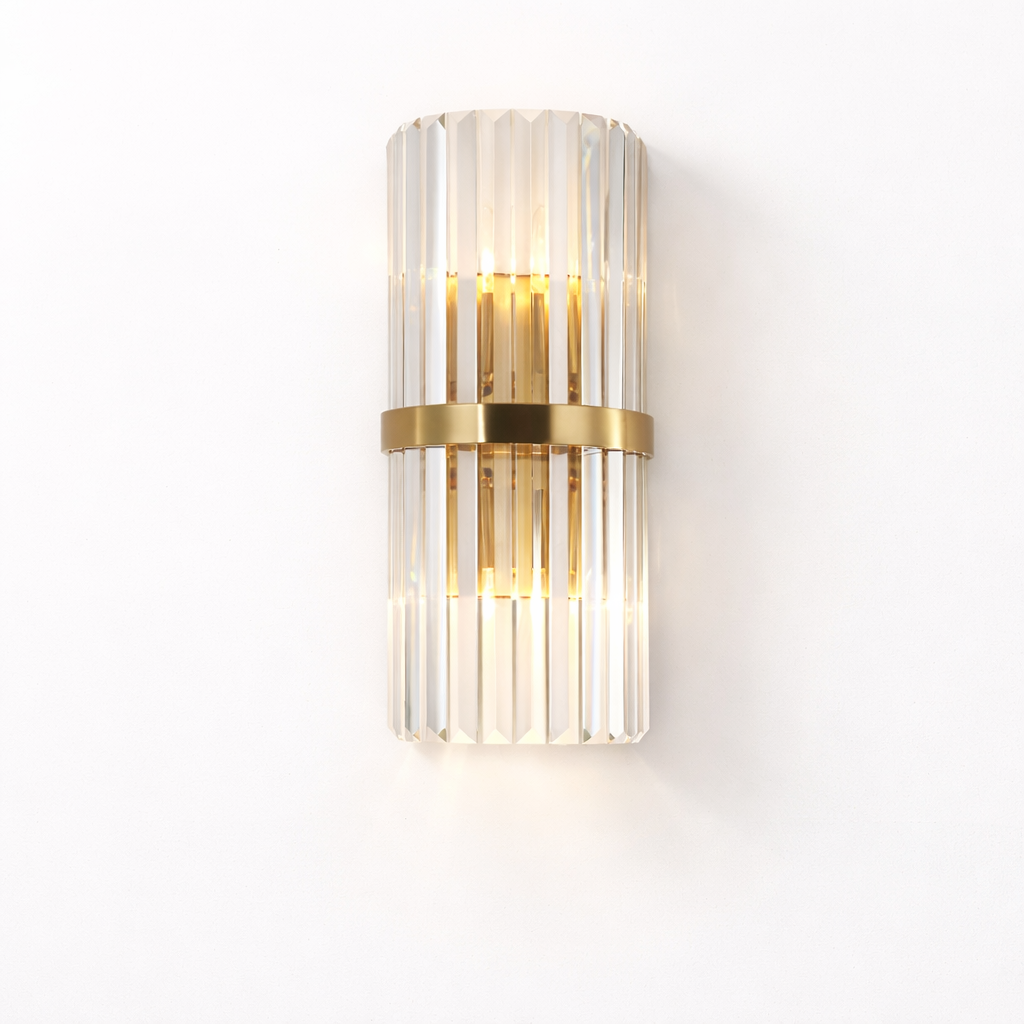 Runtz Wall Light II featuring suspended diamond cut crystal drop mounted on circular wall plate in modern design on white background