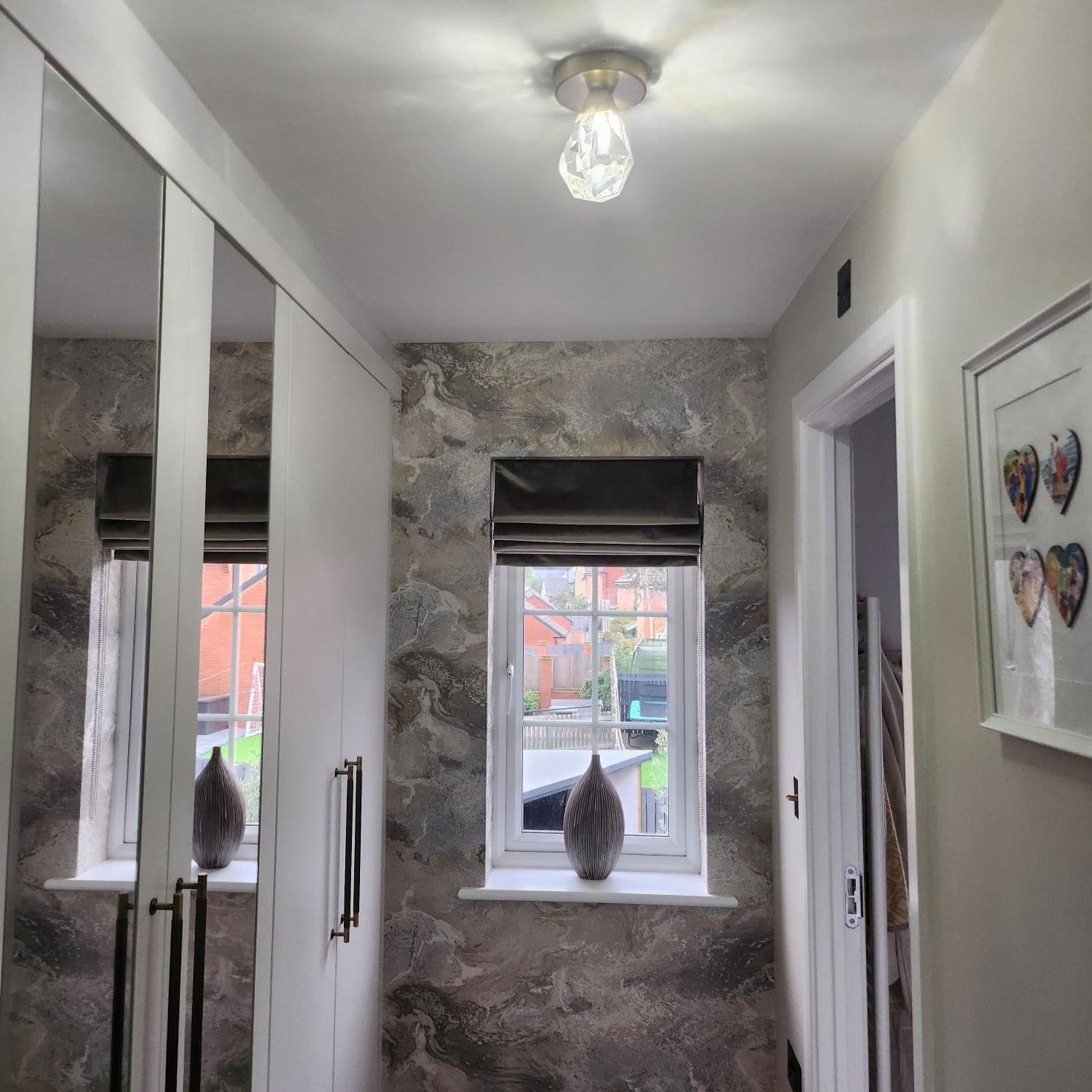 Runtz flush mounted crystal ceiling light installed in elegant corridor