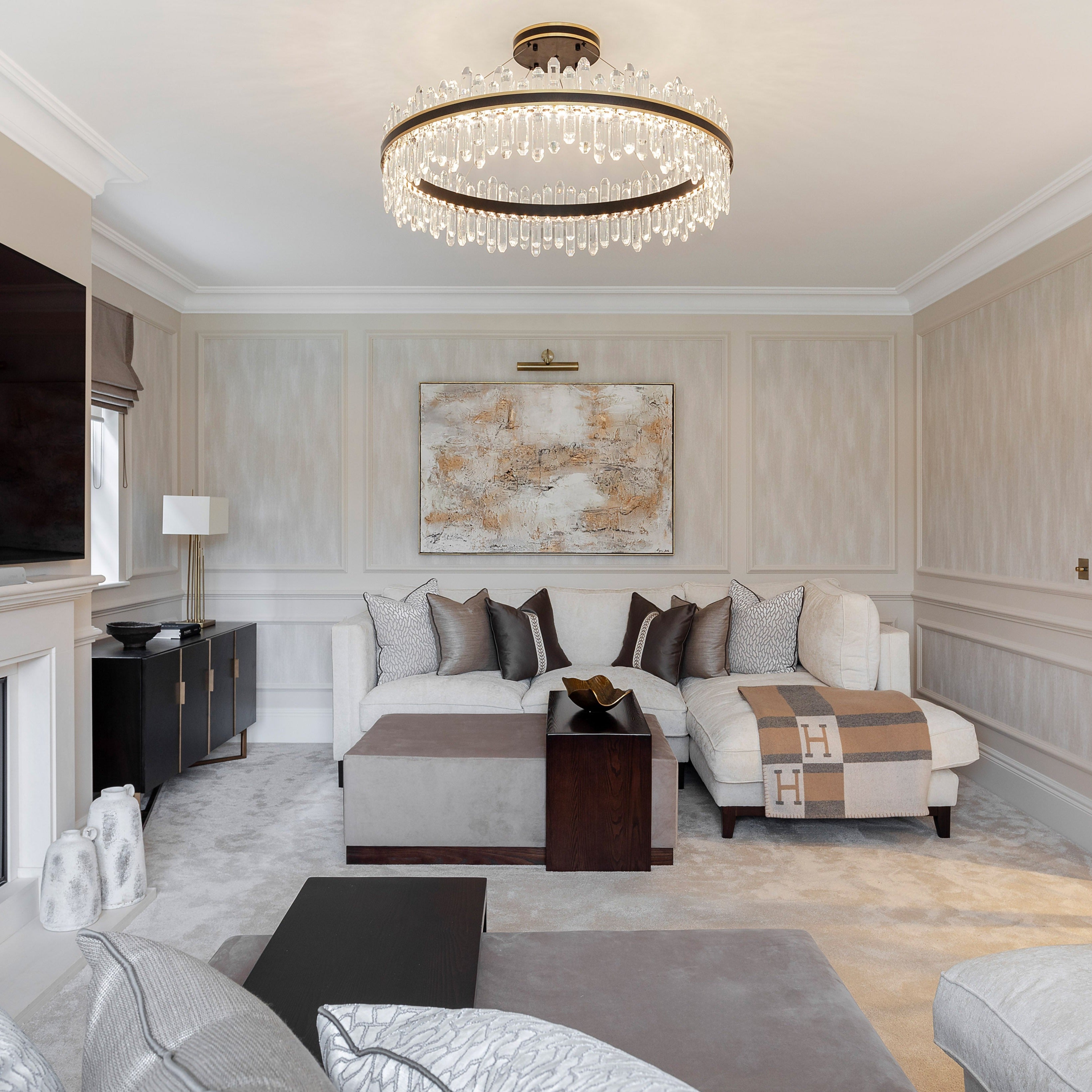Sagres luxury round crystal chandelier enhancing open plan interior with layered oblong crystal detailing