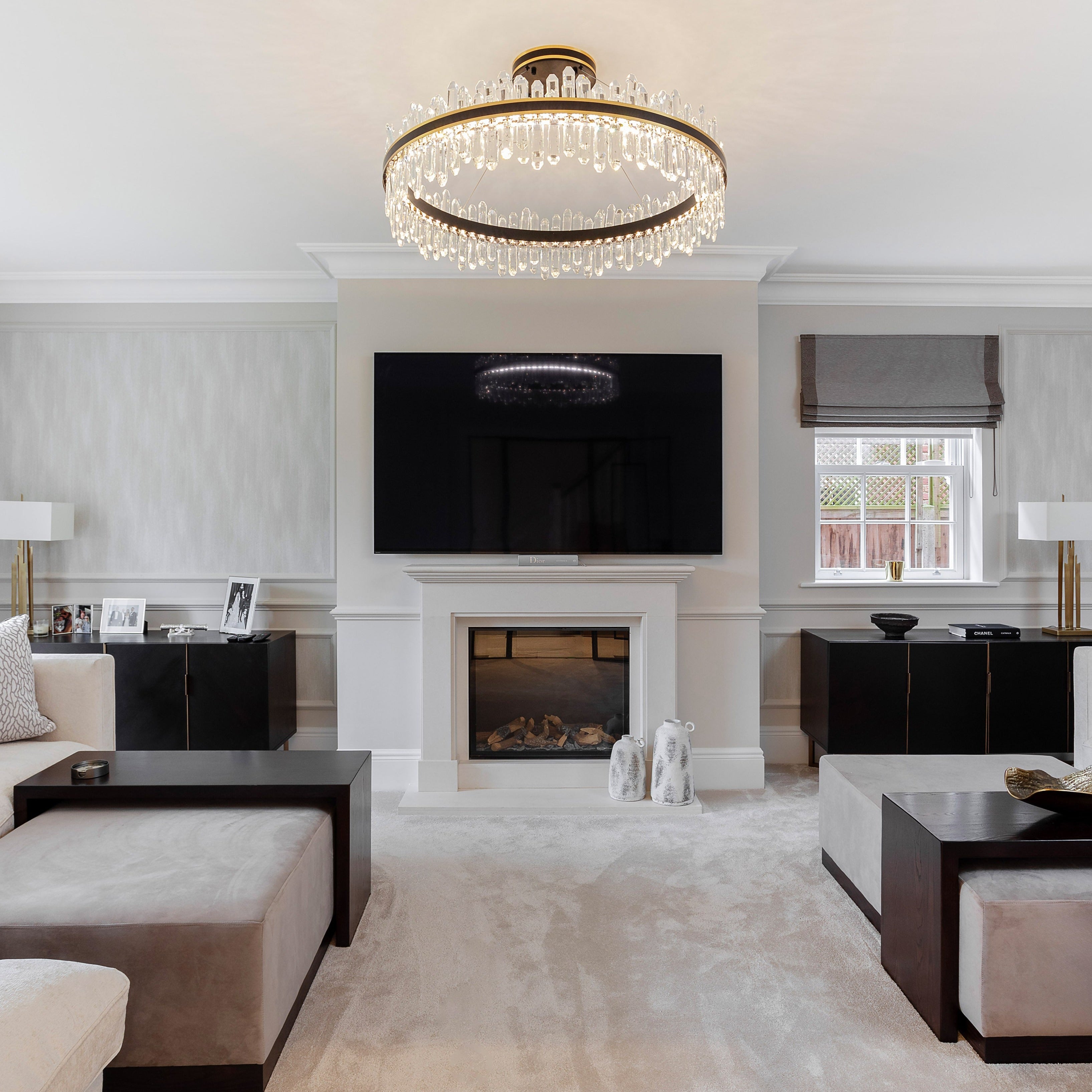 Sagres modern circular crystal chandelier installed in contemporary living space creating refined focal lighting