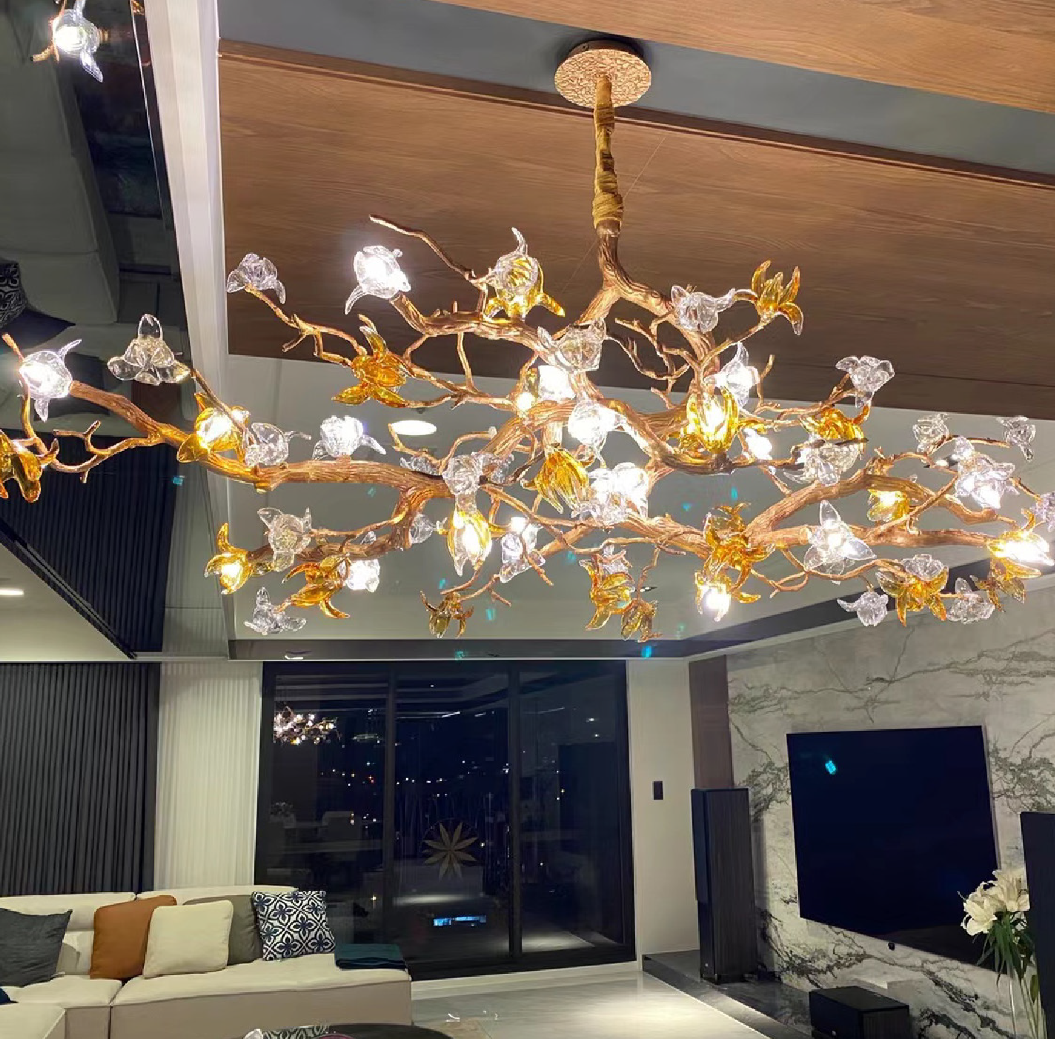 Side angle view of the Bloom chandelier highlighting the movement of hand-crafted glass petals