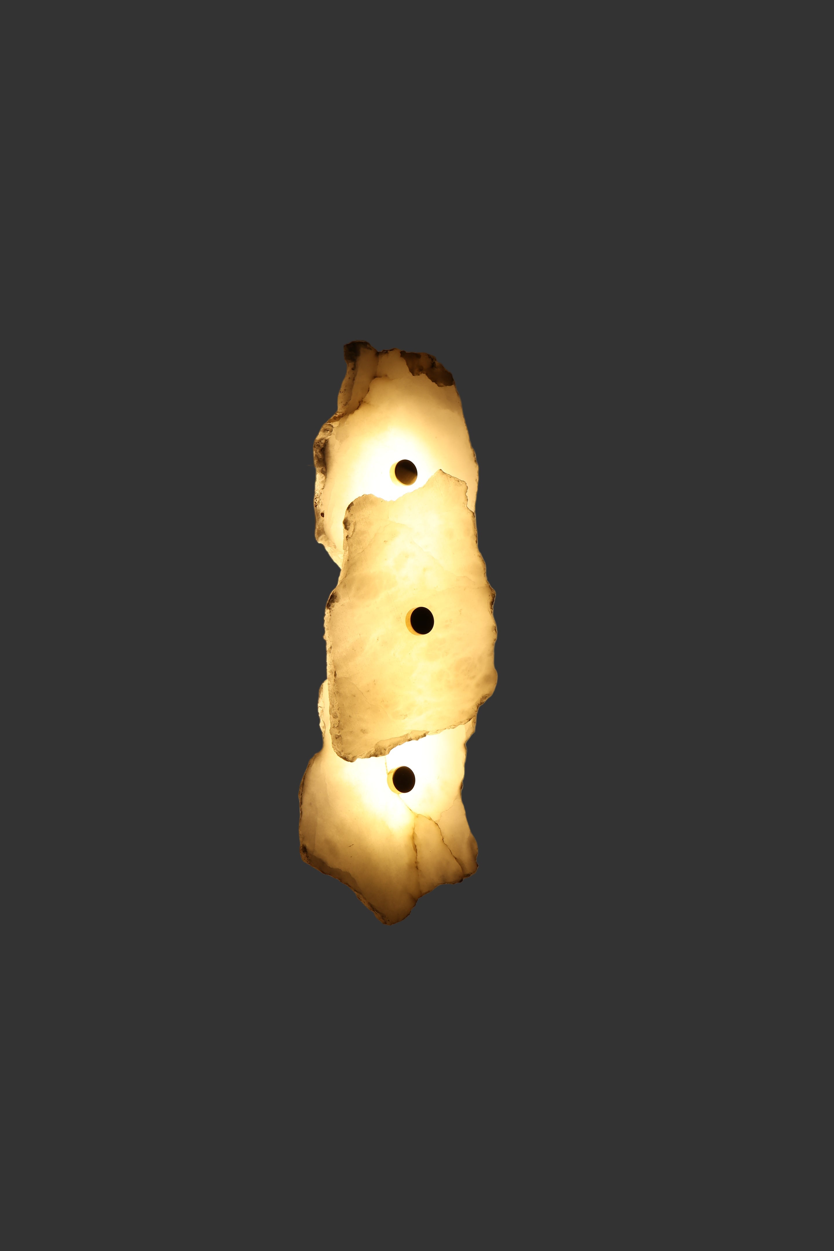 Silvio natural marble wall light installed vertically enhancing contemporary interior