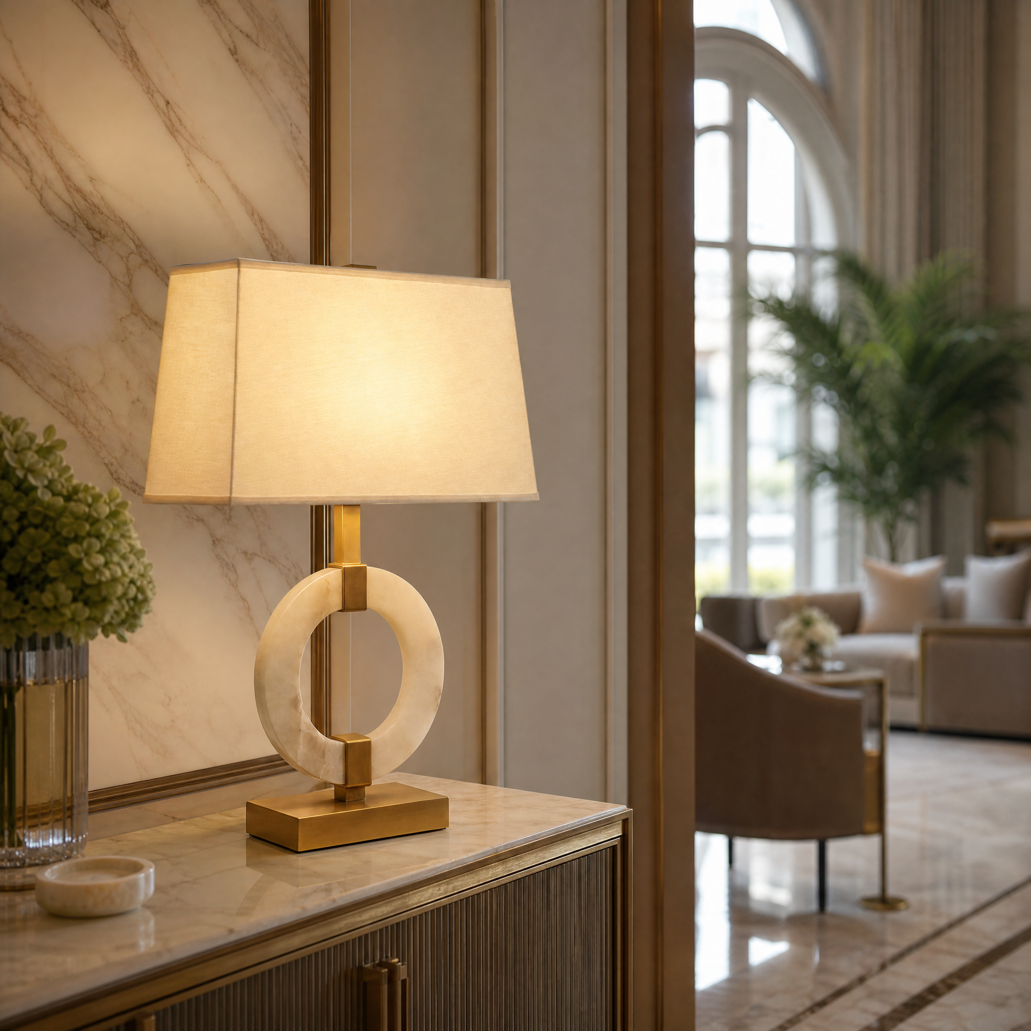 Soft ambient lighting from the Anello Marble Table Lamp creating a serene and professional atmosphere in a high-end executive office.