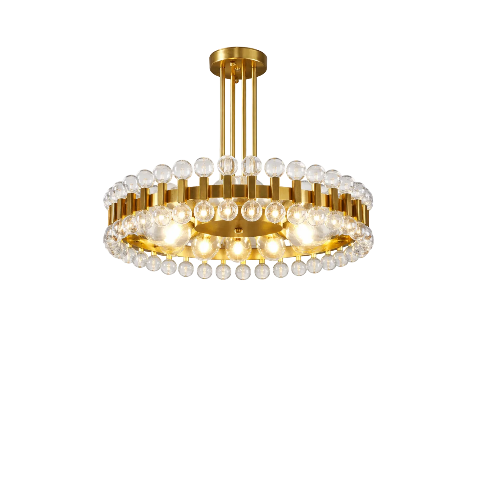 Luxury circular gold ceiling chandelier with clear glass globe lights suspended from vertical brass rods, installed above a kitchen island in a modern neutral-tone interior with cabinetry and sheer curtains.