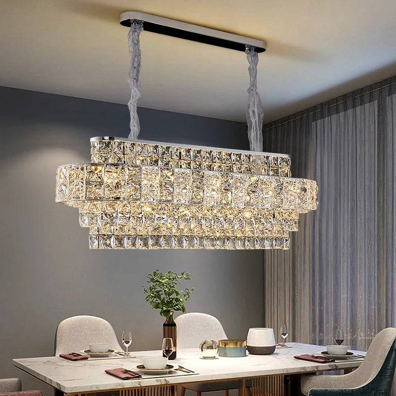 Stefano luxury rectangular multi tier crystal chandelier installed above dining table