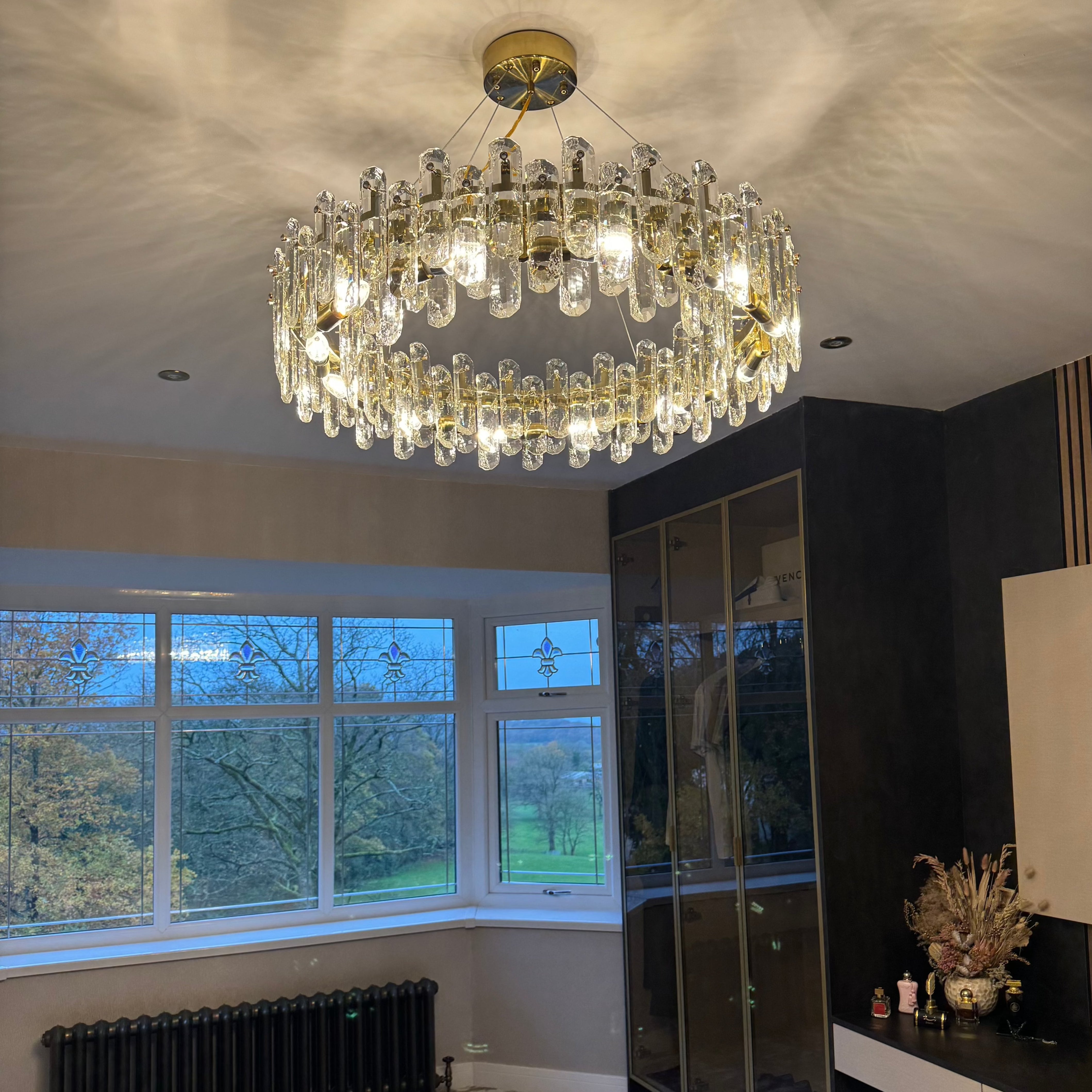 Stellina halo crystal chandelier enhancing upscale residential interior