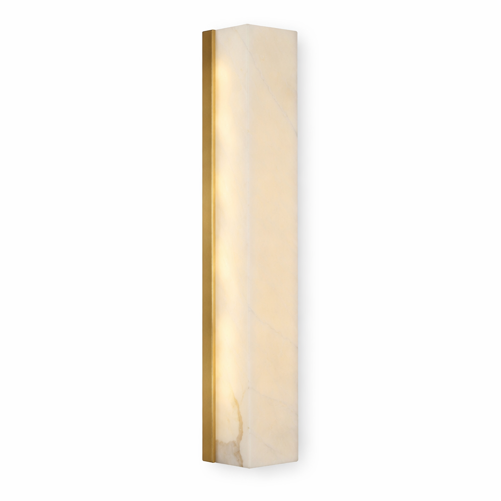 The Revo Marble Wall Light by Vorelli illuminating a luxury residential hallway with a warm, upscale glow.