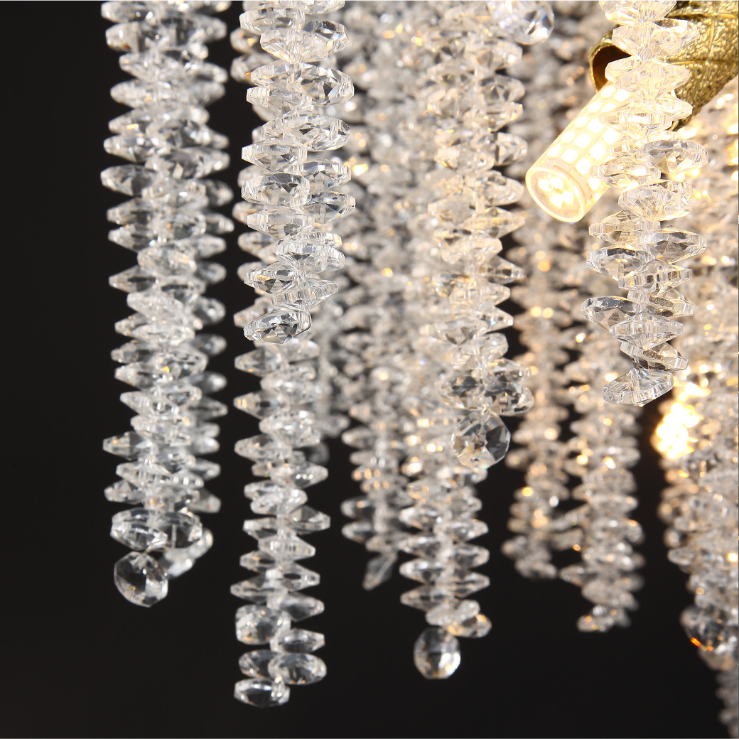 The VORELLI Wisteria Pendant Light illuminating a high-end space, creating a mood of refined movement and luxury with its natural bloom-inspired silhouette.
