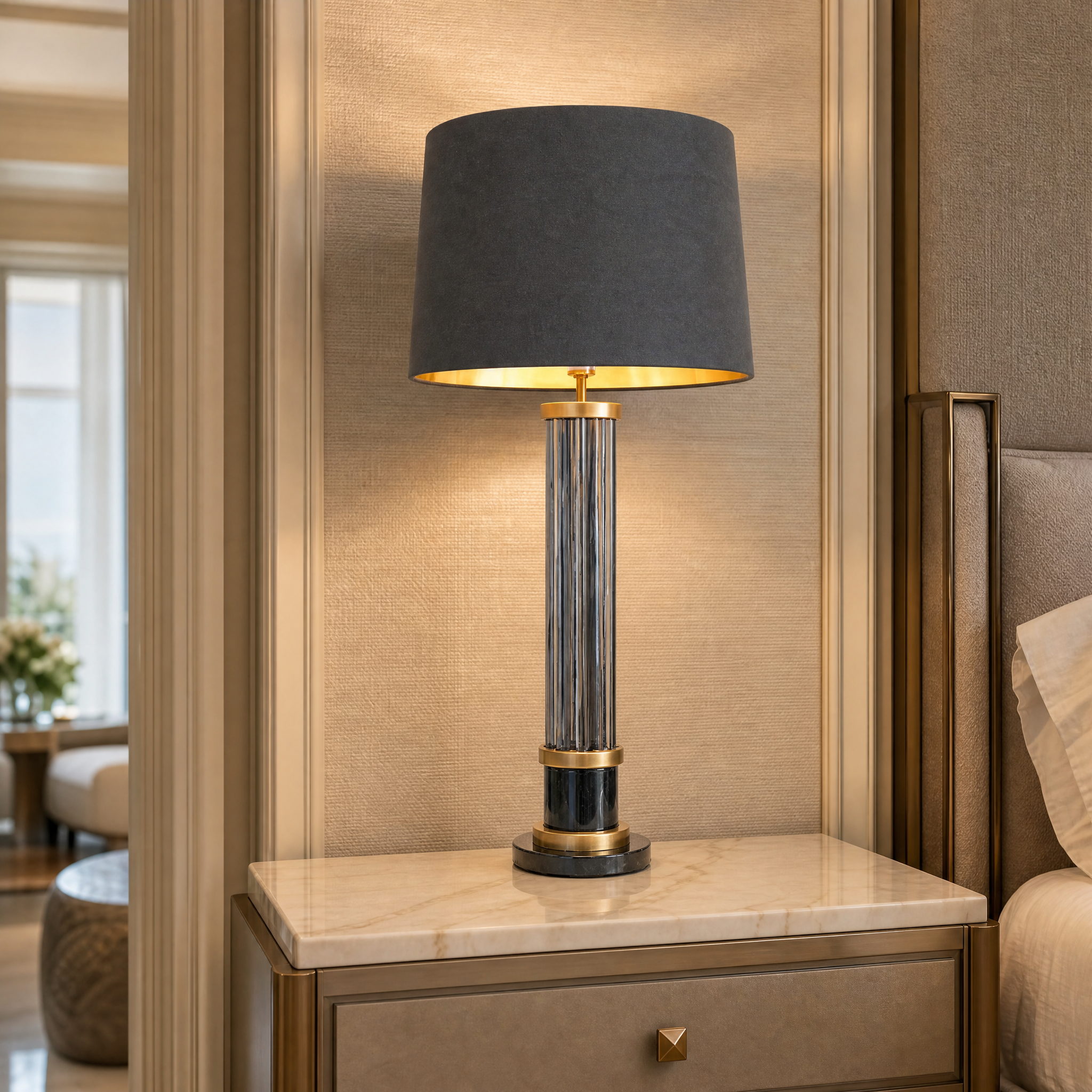 Close up detail of layered smoke glass rods and warm brass framing on the Valenro designer table lamp