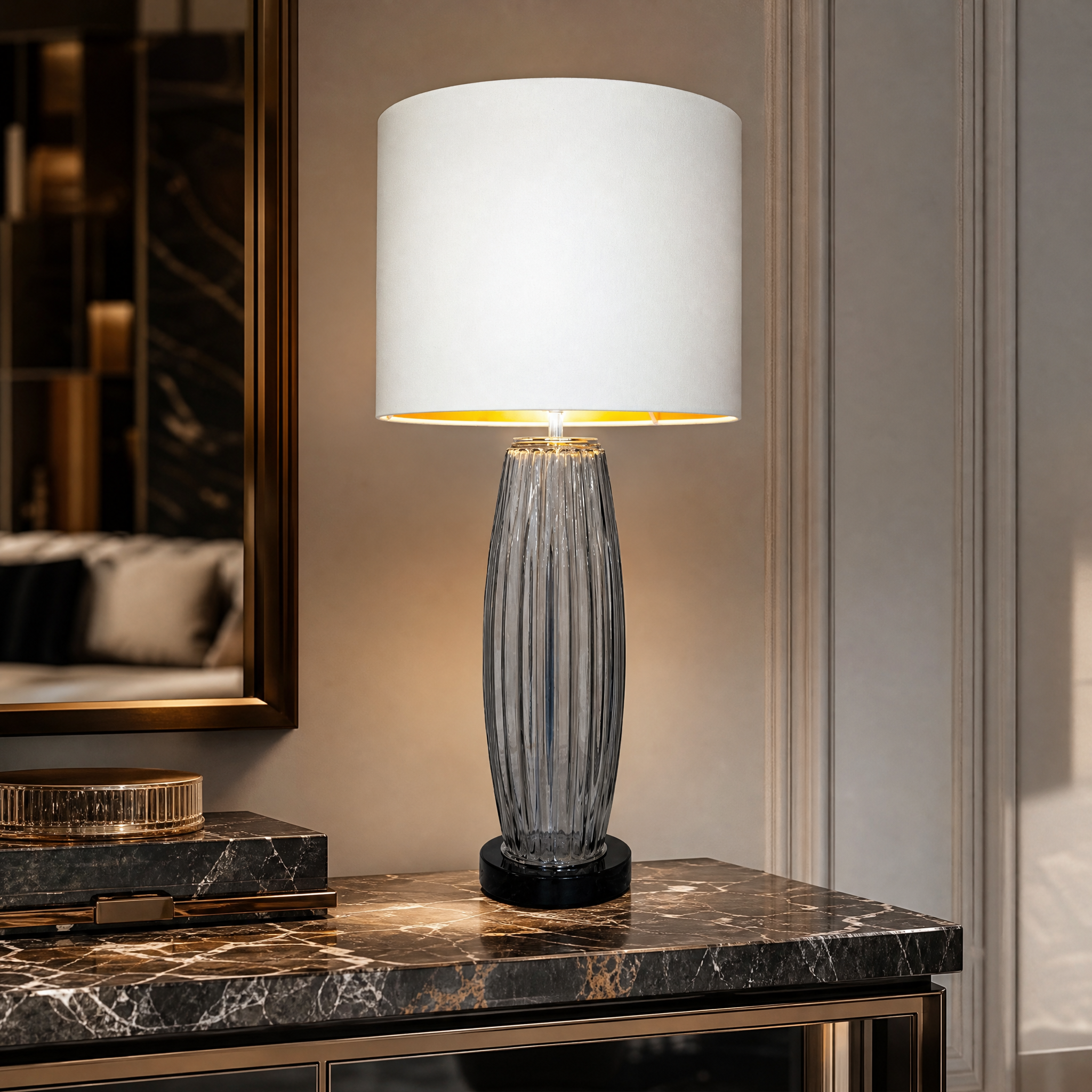 Close-up detail of the Velora lamp showing the vertically textured smoked glass and polished black marble base.