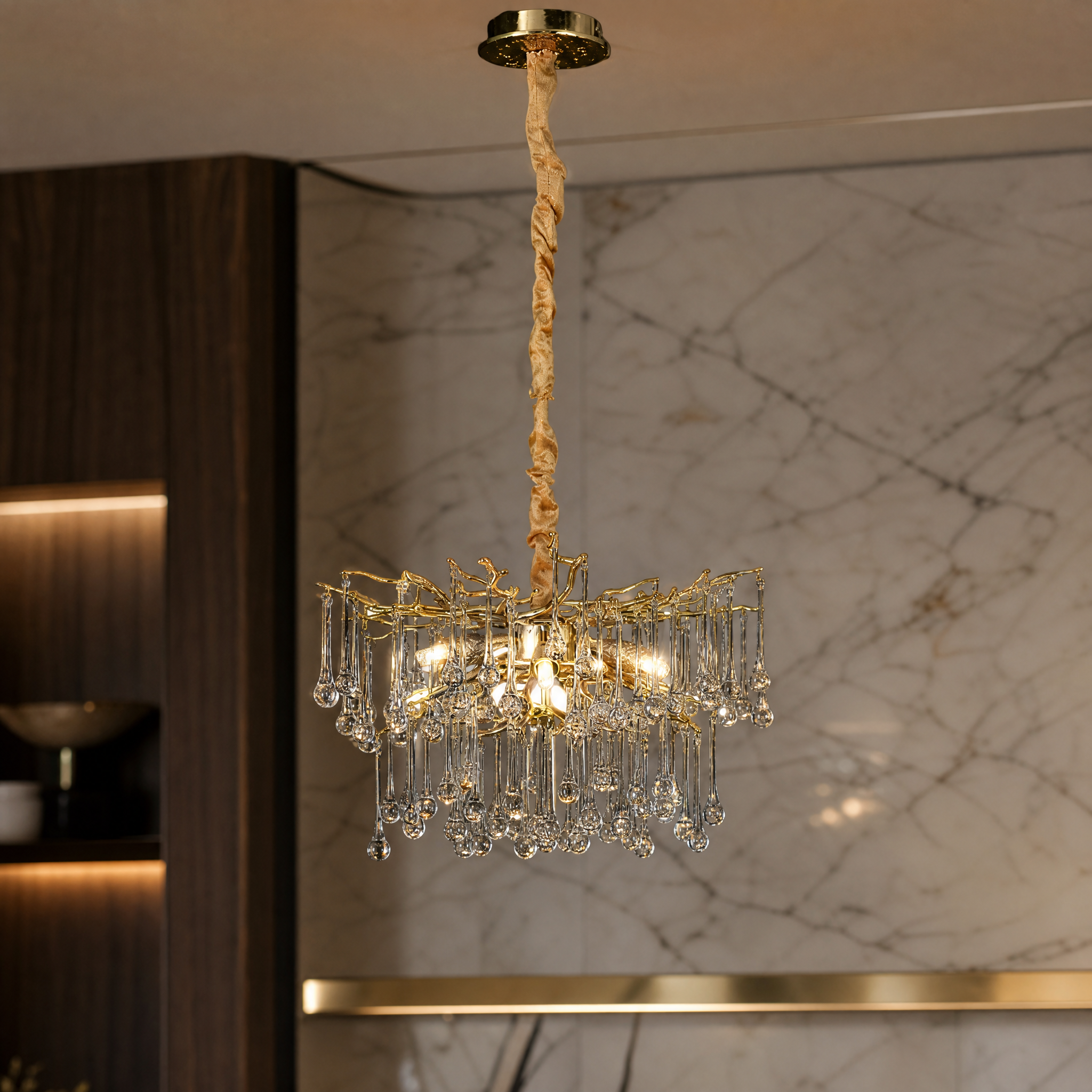 A detailed close-up of the VORELLI L’Albero d’Oro Pendant Light II, highlighting the intricate sculptural branches and cascading crystal drops that create depth and movement.