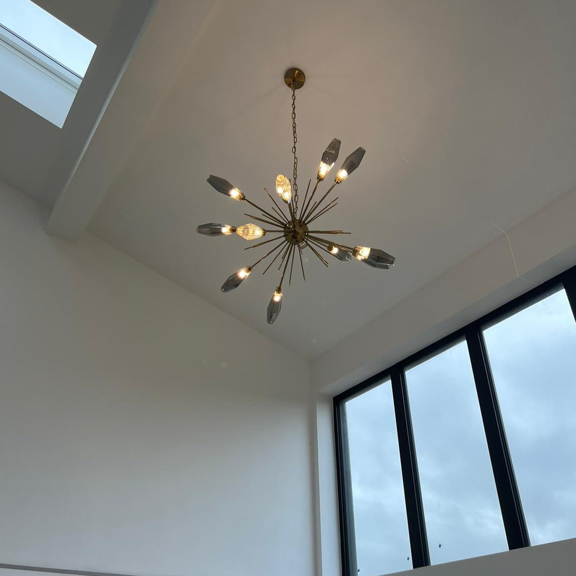 Side view of the VORELLI® Abdera Pendant showing sculptural spikes and smoky glass